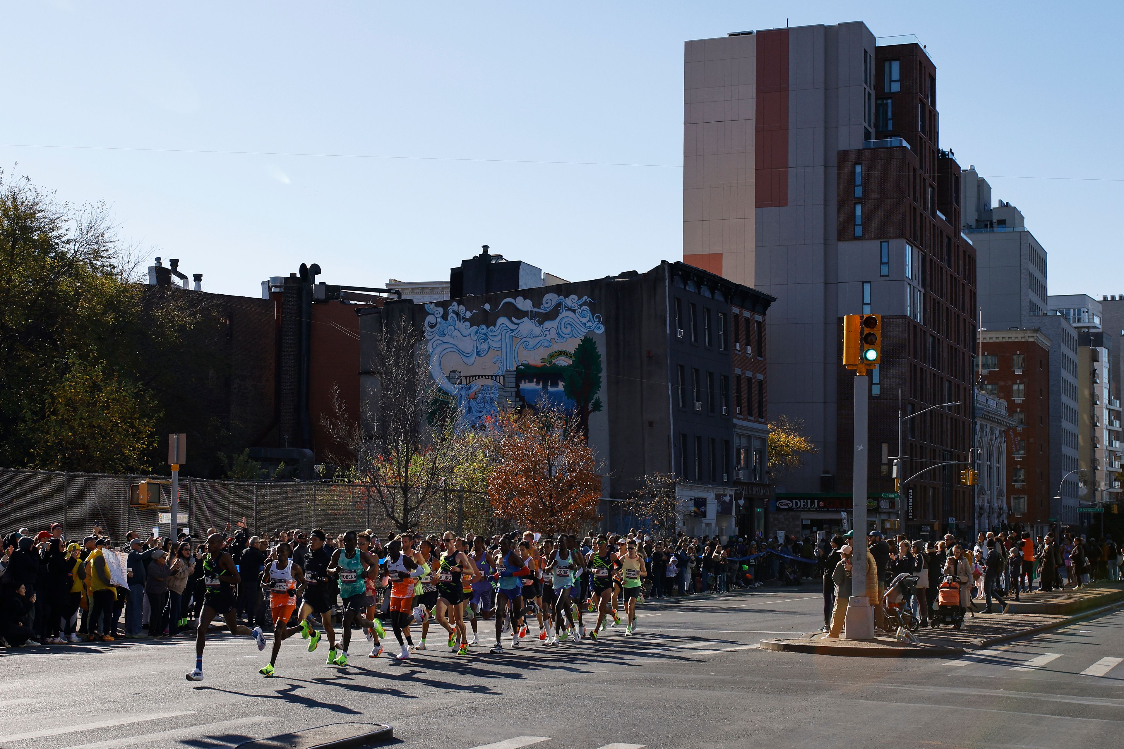 Runners in the men's elite division make their way through the Brooklyn borough during the New York City Marathon, Sunday, Nov. 3, 2024, in New York. (AP Photo/Eduardo Munoz Alvarez)