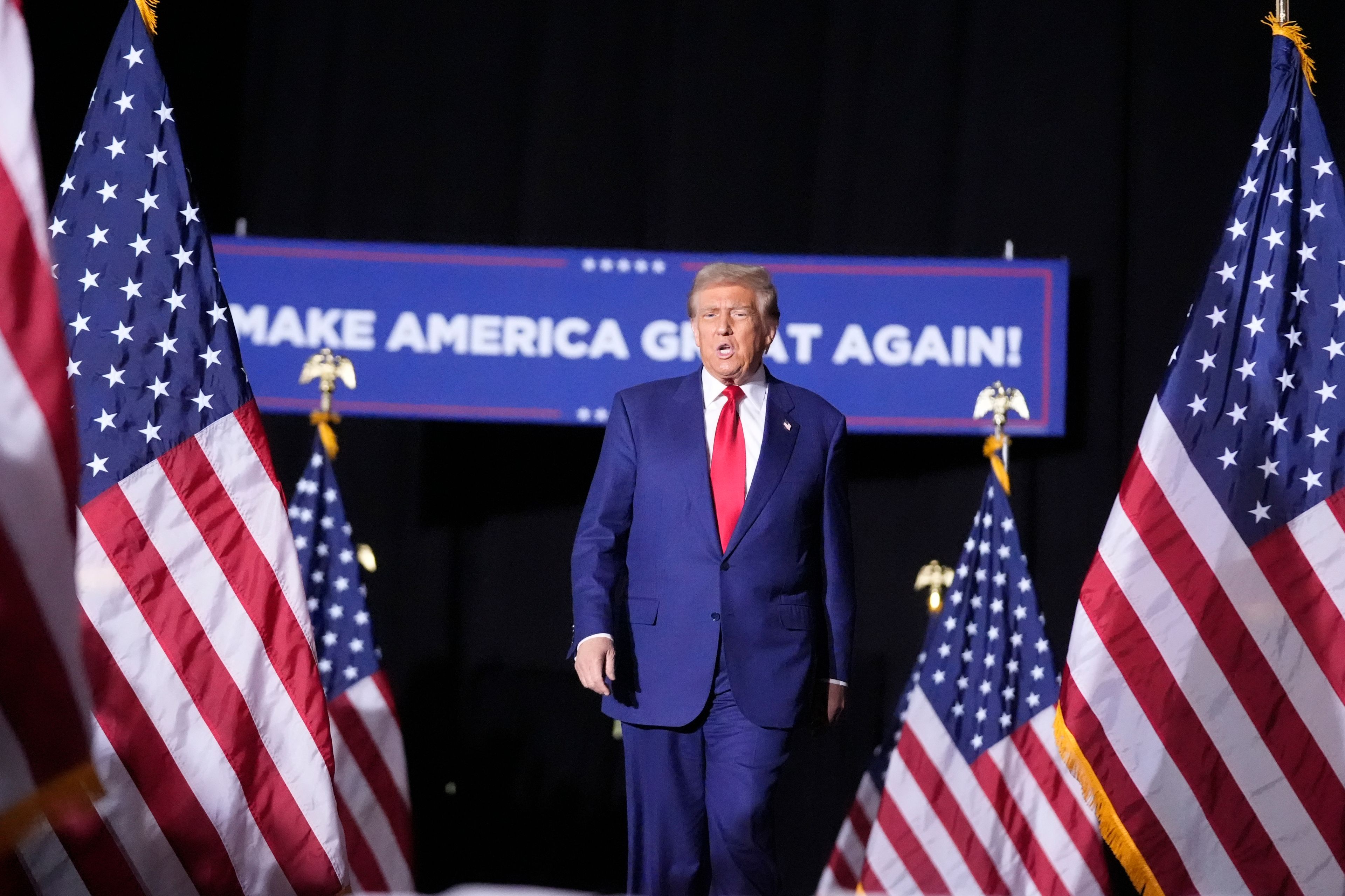 Republican presidential nominee former President Donald Trump arrives to speak during a campaign rally at the Suburban Collection Showplace, Saturday, Oct. 26, 2024, in Novi, Mich. (AP Photo/Alex Brandon)