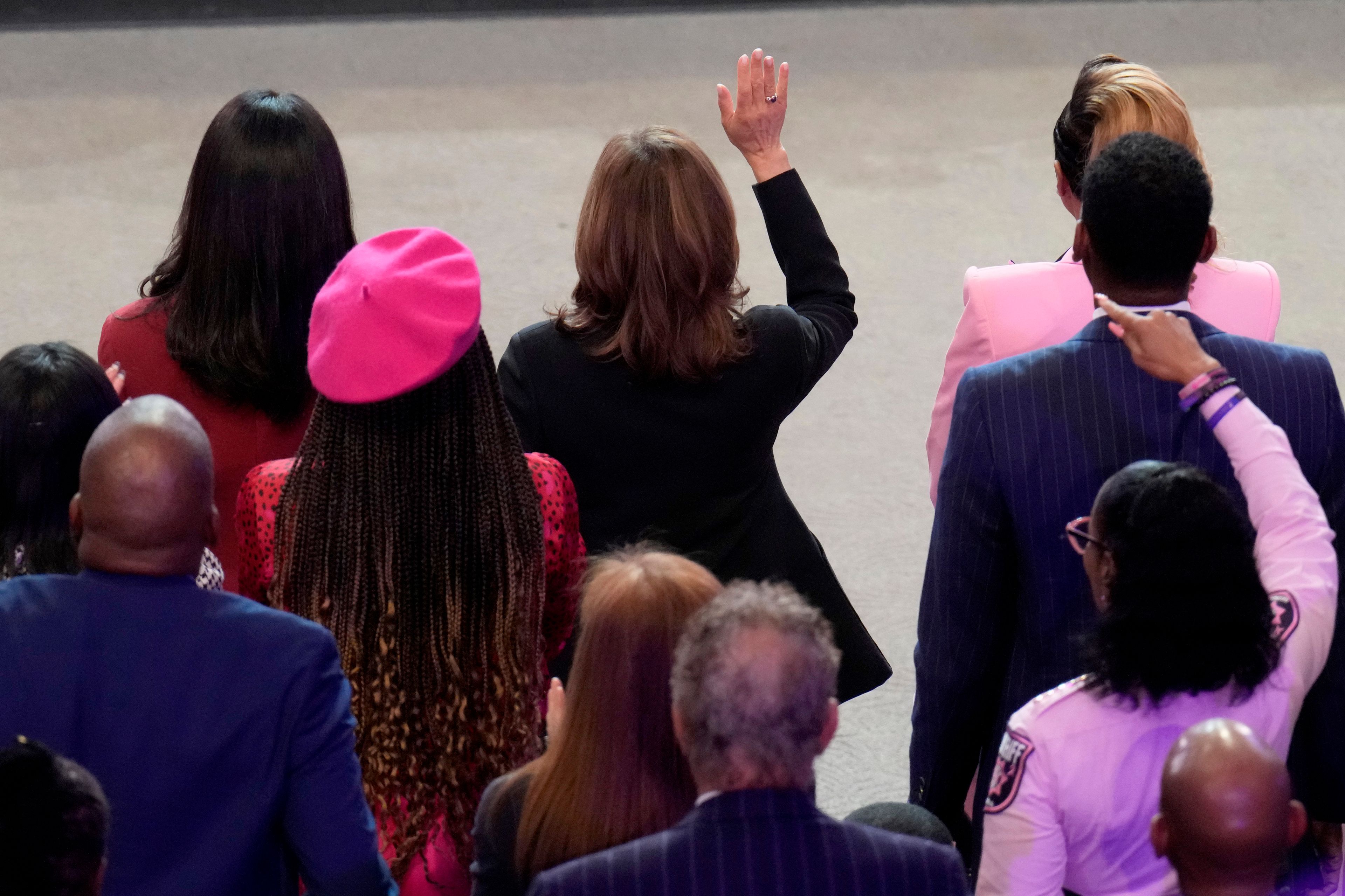 Democratic presidential nominee Vice President Kamala Harris, top center, attends a church service at New Birth Baptist Church in Stonecrest, Ga., Sunday, Oct. 20, 2024. (AP Photo/Jacquelyn Martin)