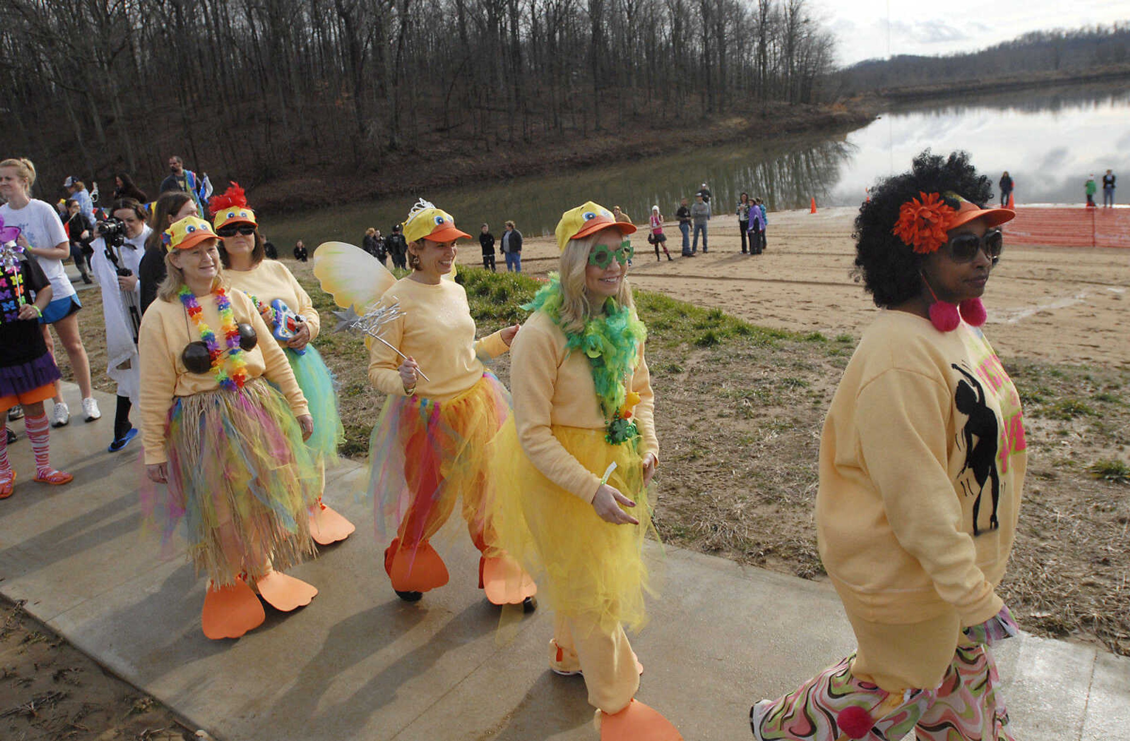 KRISTIN EBERTS ~ keberts@semissourian.com

Teams show off their costumes in a parade during the 2012 Polar Plunge at the Trail of Tears State Park's Lake Boutin on Saturday, Feb. 4, 2012.