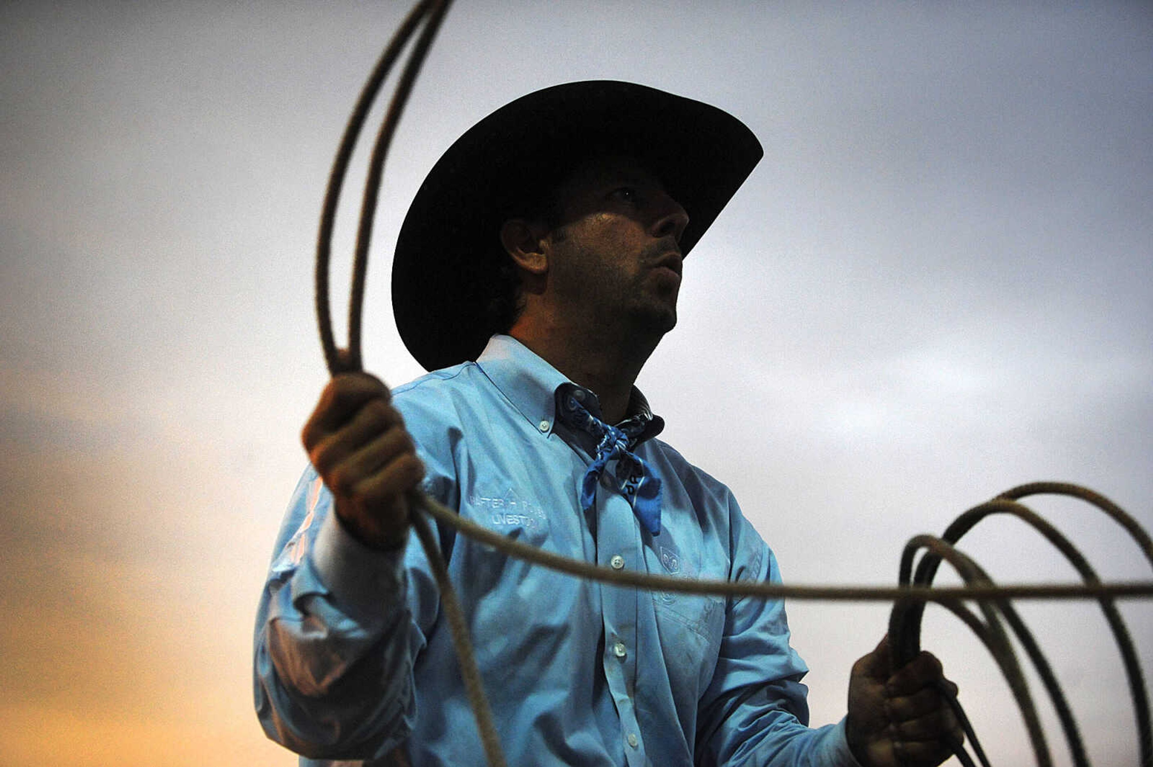 LAURA SIMON ~ lsimon@semissourian.com

A horse wrangler prepares his lasso during the steer wrestling competition, Wednesday, Aug. 6, 2014, during the Sikeston Jaycee Bootheel Rodeo.