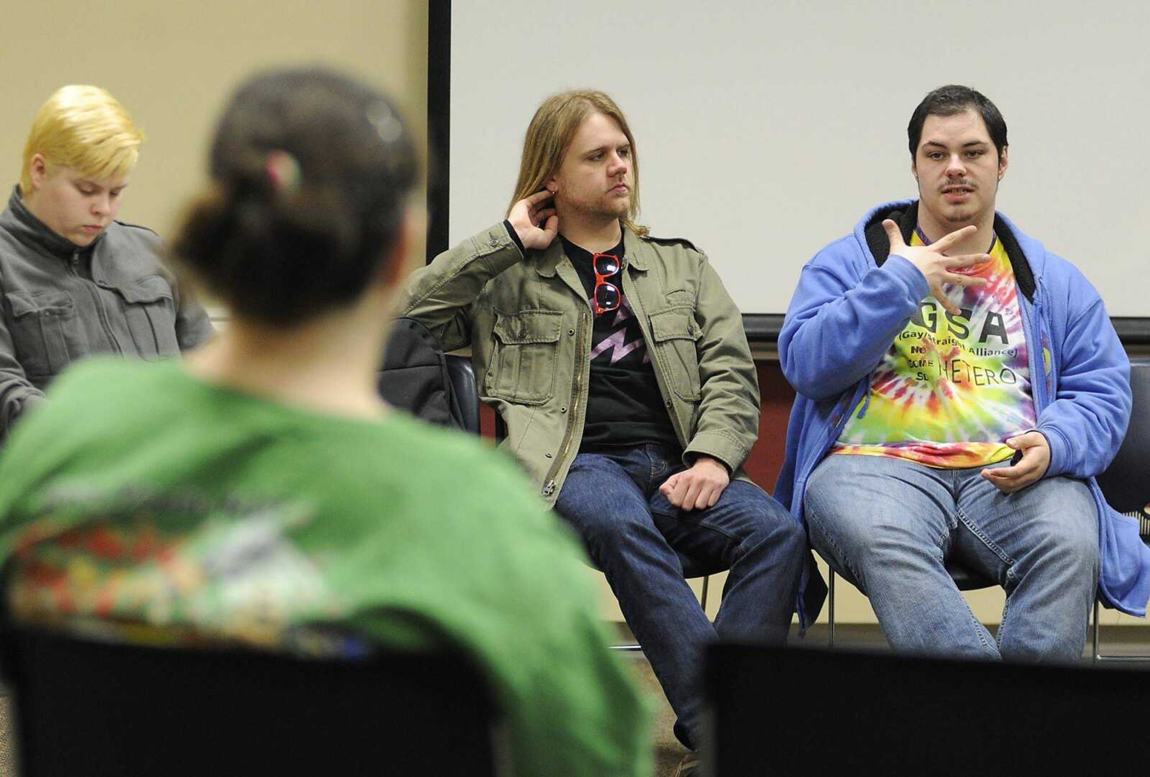 Southeast Missouri State University&#8217;s Gay Straight Alliance president James Francis, right, speaks during the group&#8217;s meeting March 27 in the University Center&#8217;s Indian Room. The group states its mission as being &#8220;to celebrate the diversity of sexual orientations found at Southeast Missouri State University.&#8221; (ADAM VOGLER)