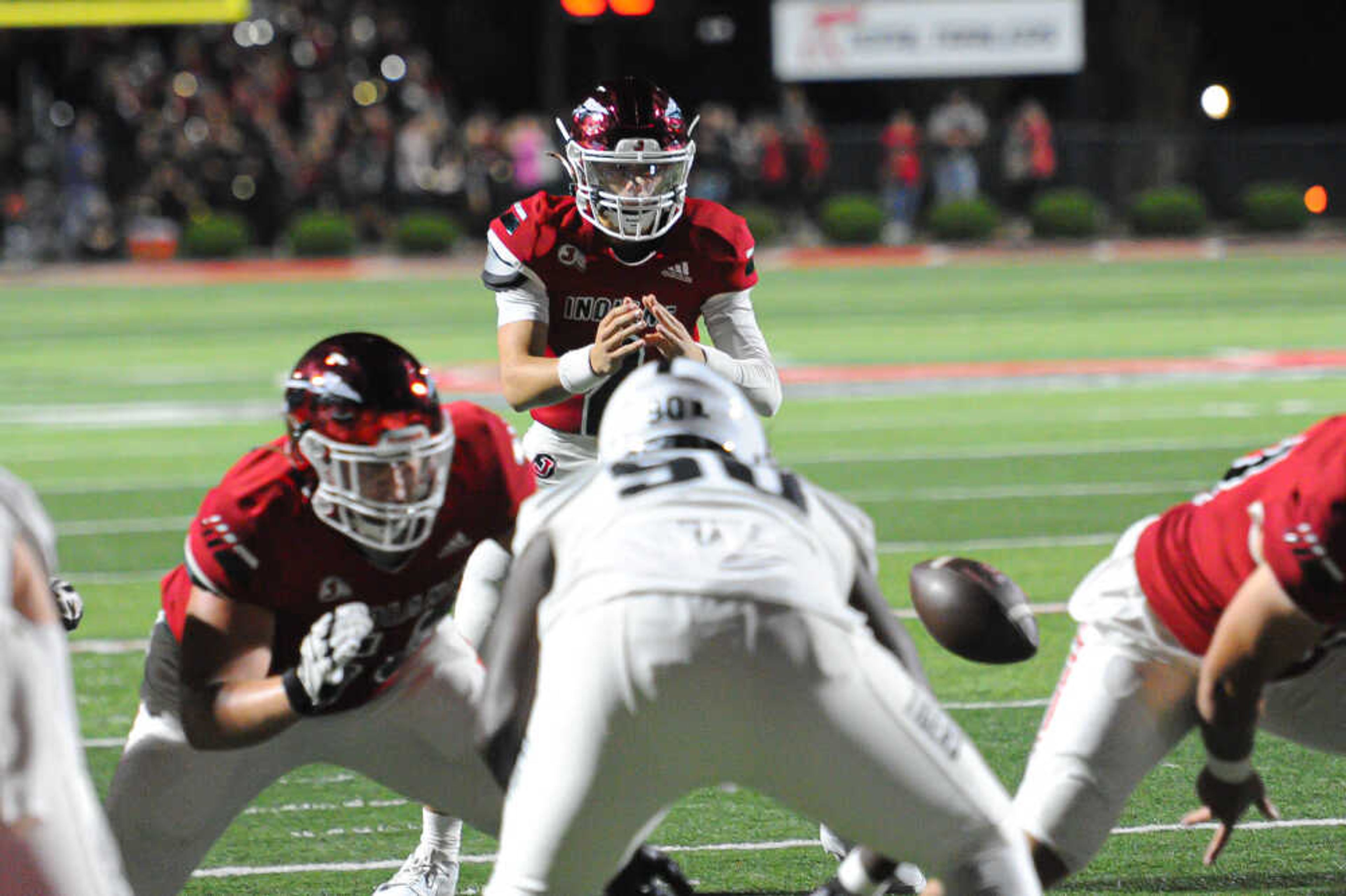 Jackson’s Drew Parsons receives the snap during a game between the Jackson Indians and the Festus Tigers on Oct. 25 at “The Pit” in Jackson.