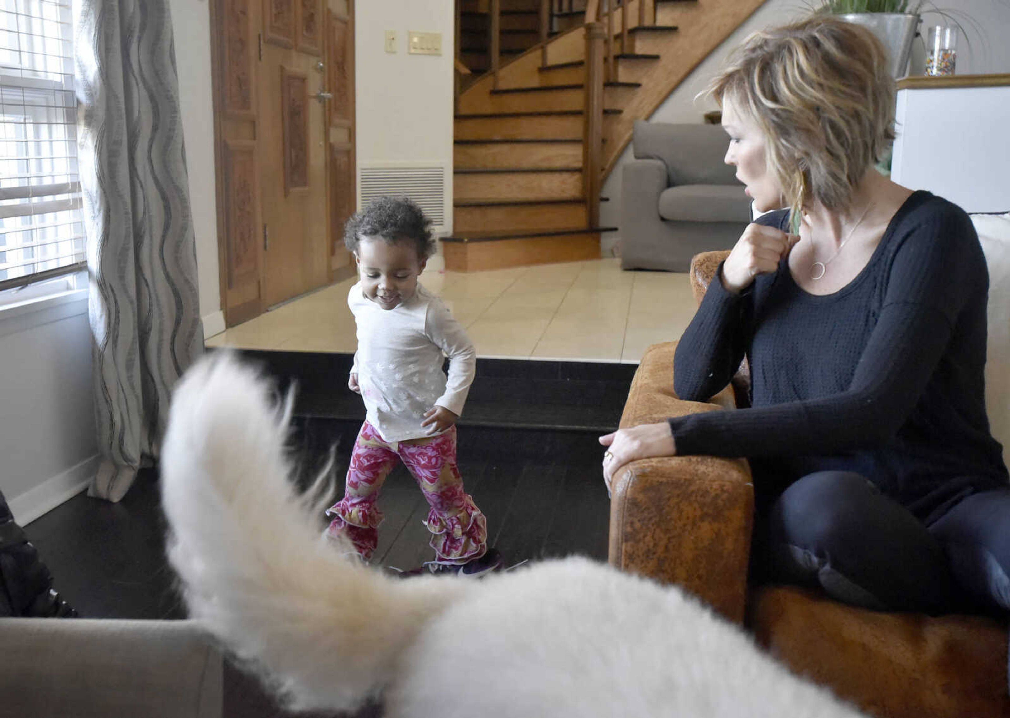 Lennyx Becking shoes her mother, Chantelle, her shoes on Saturday, Jan. 28, 2017, at the Becking's Cape Girardeau home.