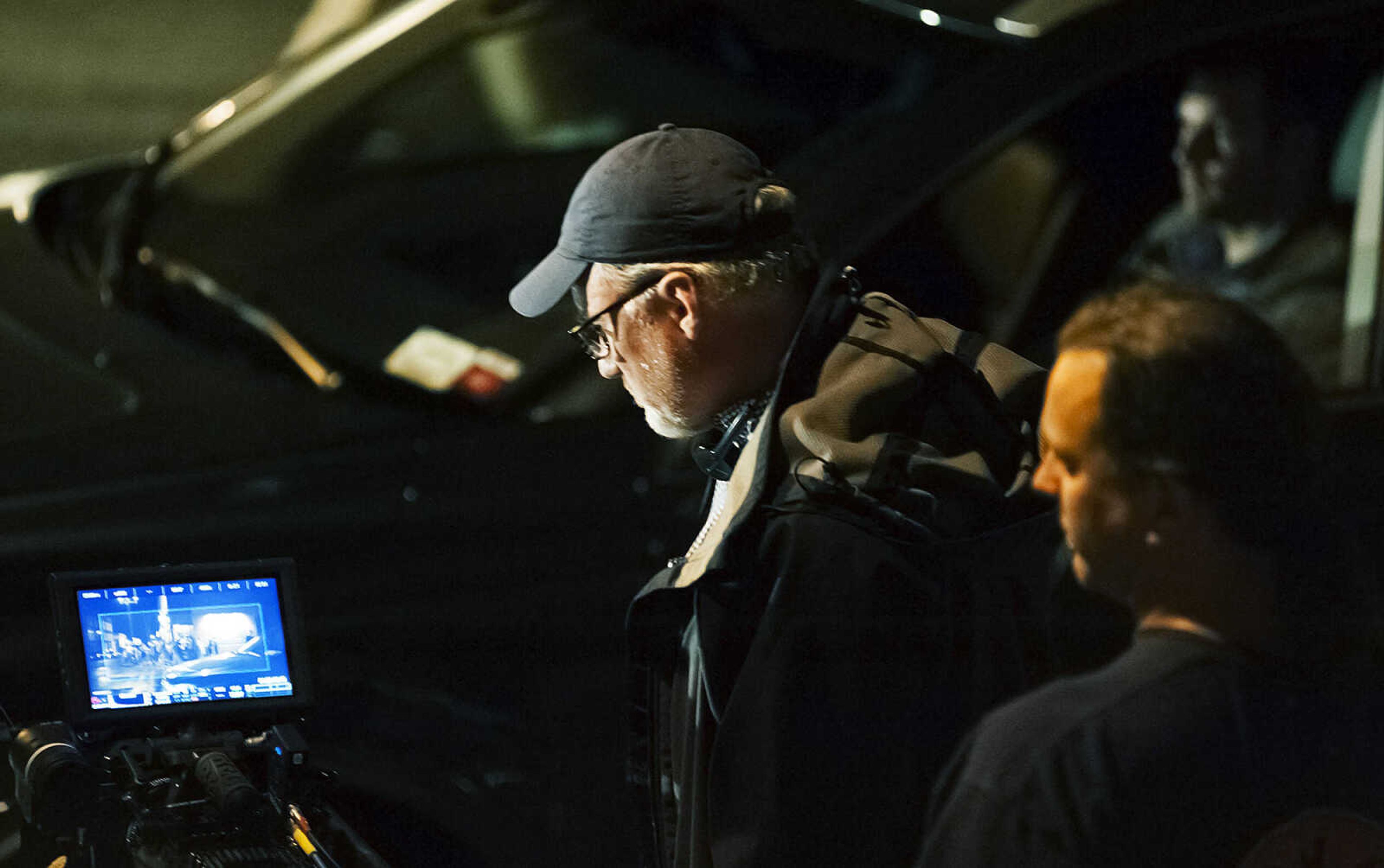 ADAM VOGLER ~ avogler@semissourian.com
Director David Fincher sets up to film a scene for the 20th Century Fox feature film "Gone Girl," Friday, Sept. 27, in downtown Cape Girardeau. The stand-in for actor Ben Affleck can be seen in the car at the right.