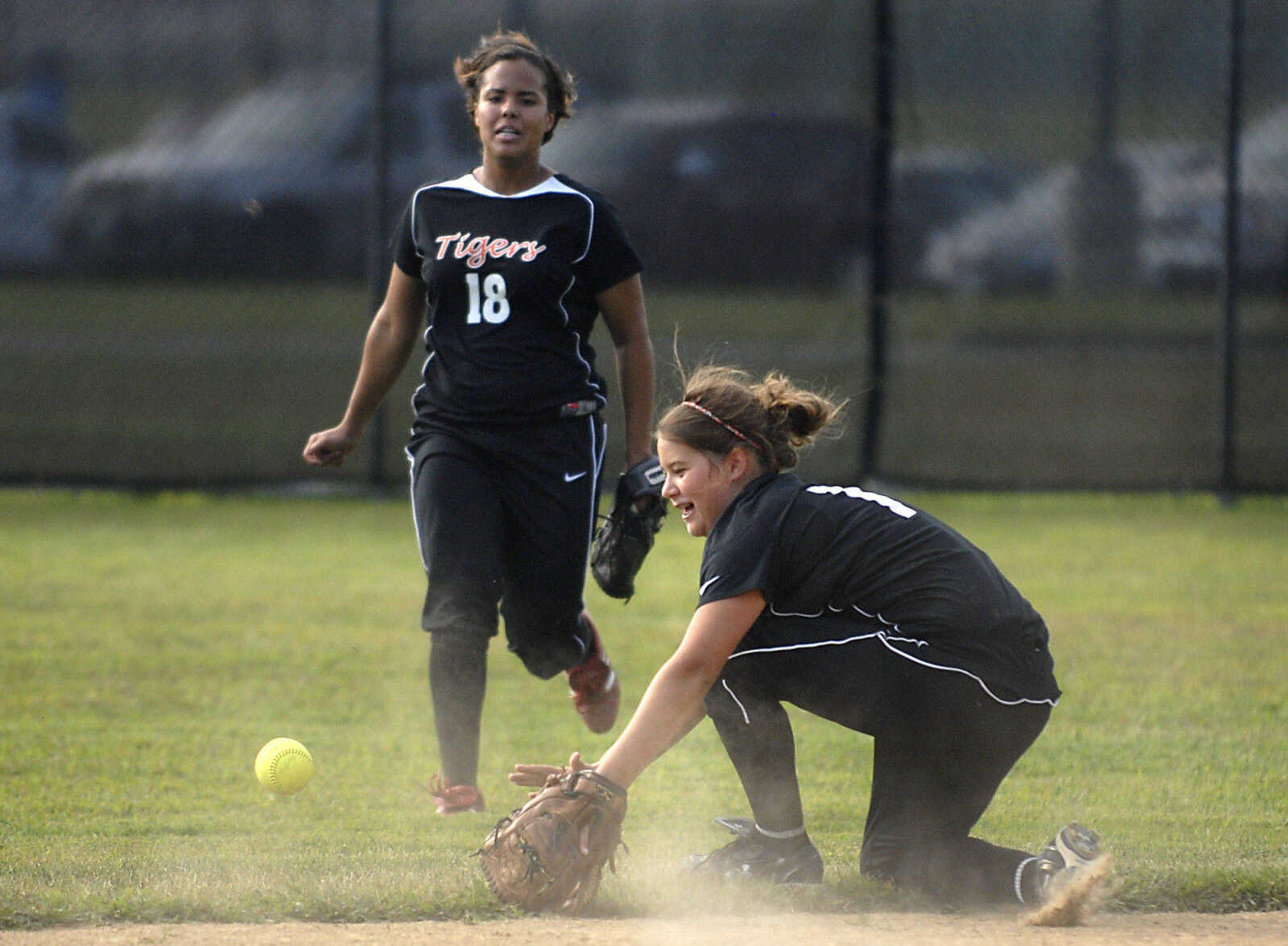 KIT DOYLE ~ kdoyle@semissourian.com
Central shortstop Bailey Kratochvil can't bring in a pop fly Wednesday, September 2, 2009, in Cape Girardeau.