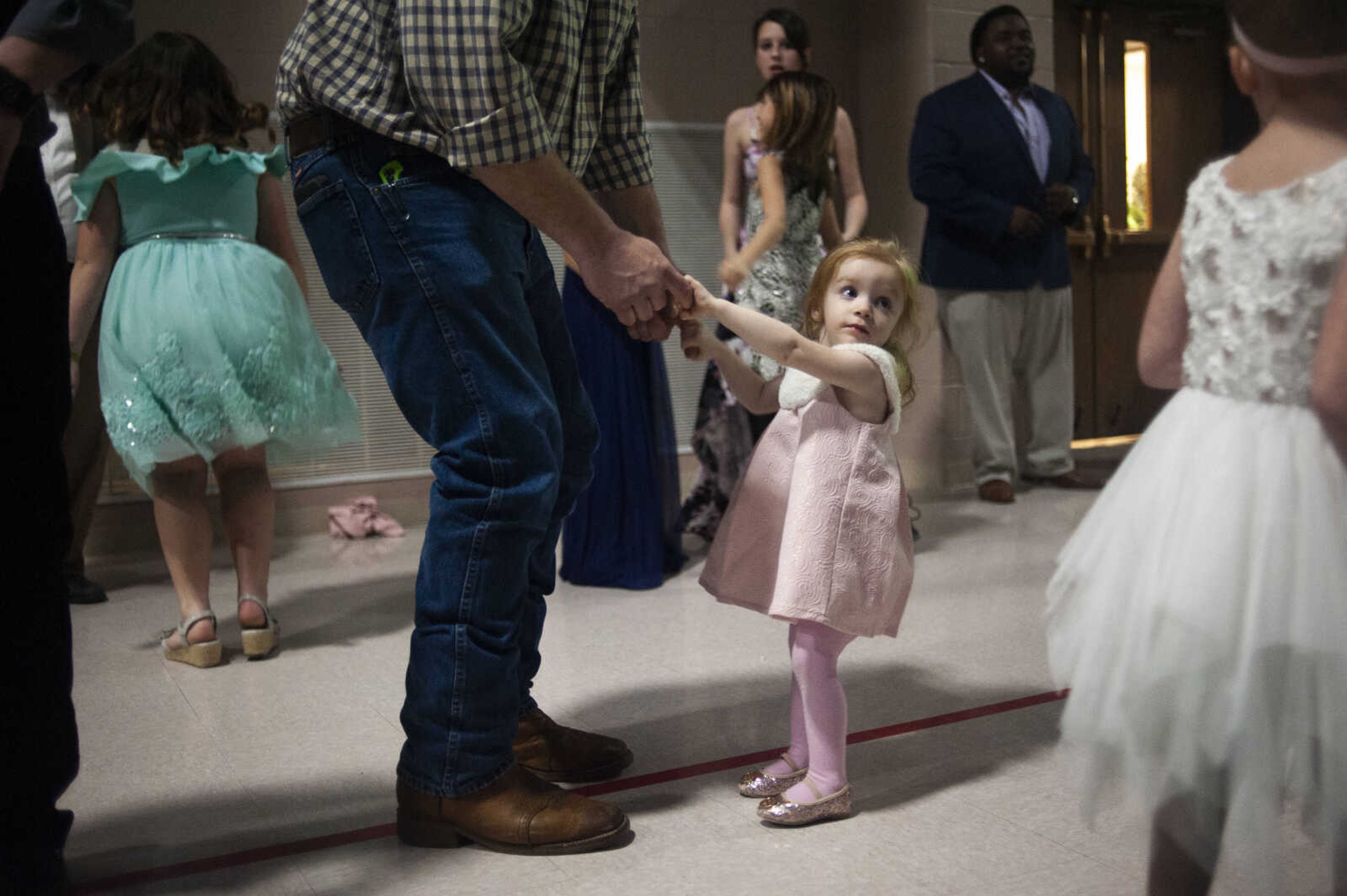 Lillian Schultz of Whitewater, 2, dances with her father Jared Schultz during the 11th annual Father Daughter Dance on Saturday, Feb. 16, 2019, at Osage Centre in Cape Girardeau.