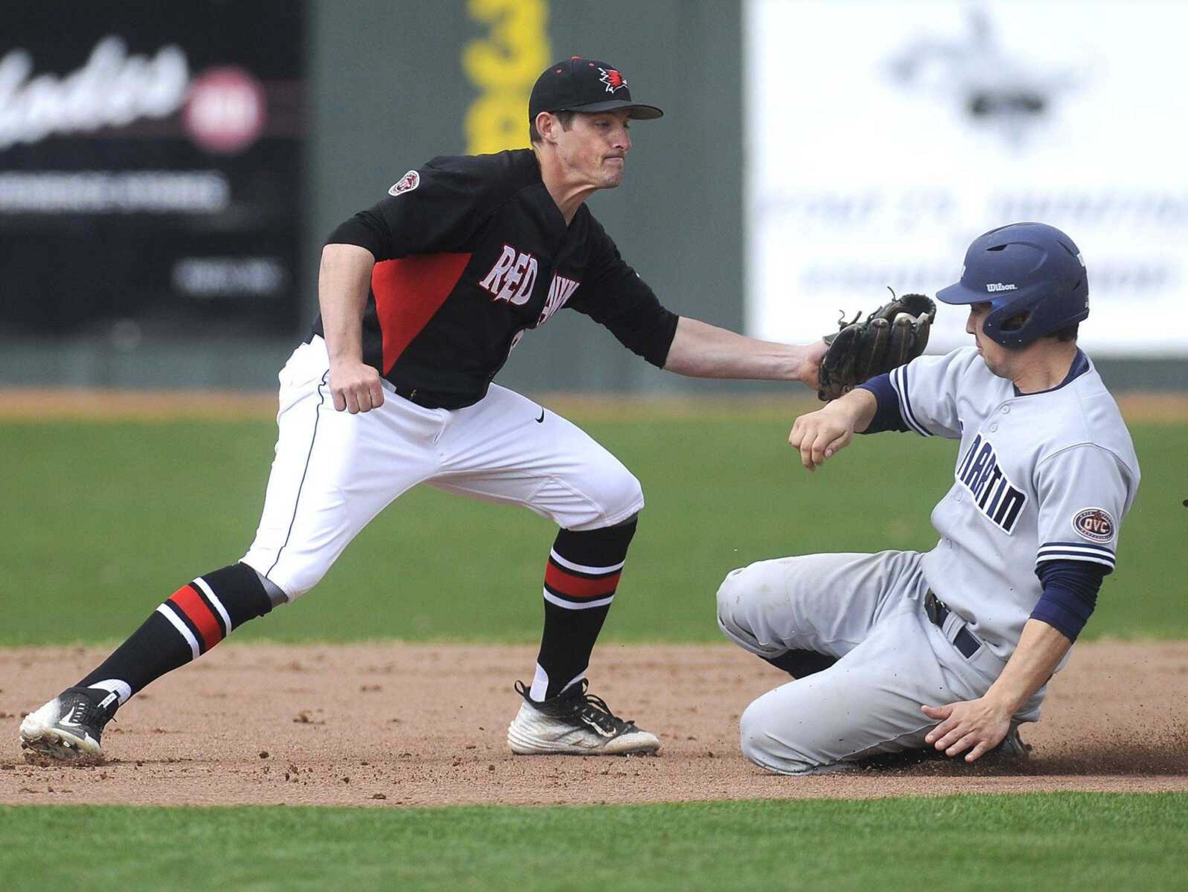 Southeast Missouri State second baseman Jason Blum tags out UT-Martin's Andrew Castillo on a steal attempt during the first inning Friday, March 20, 2015 at Capaha Field. (Fred Lynch)