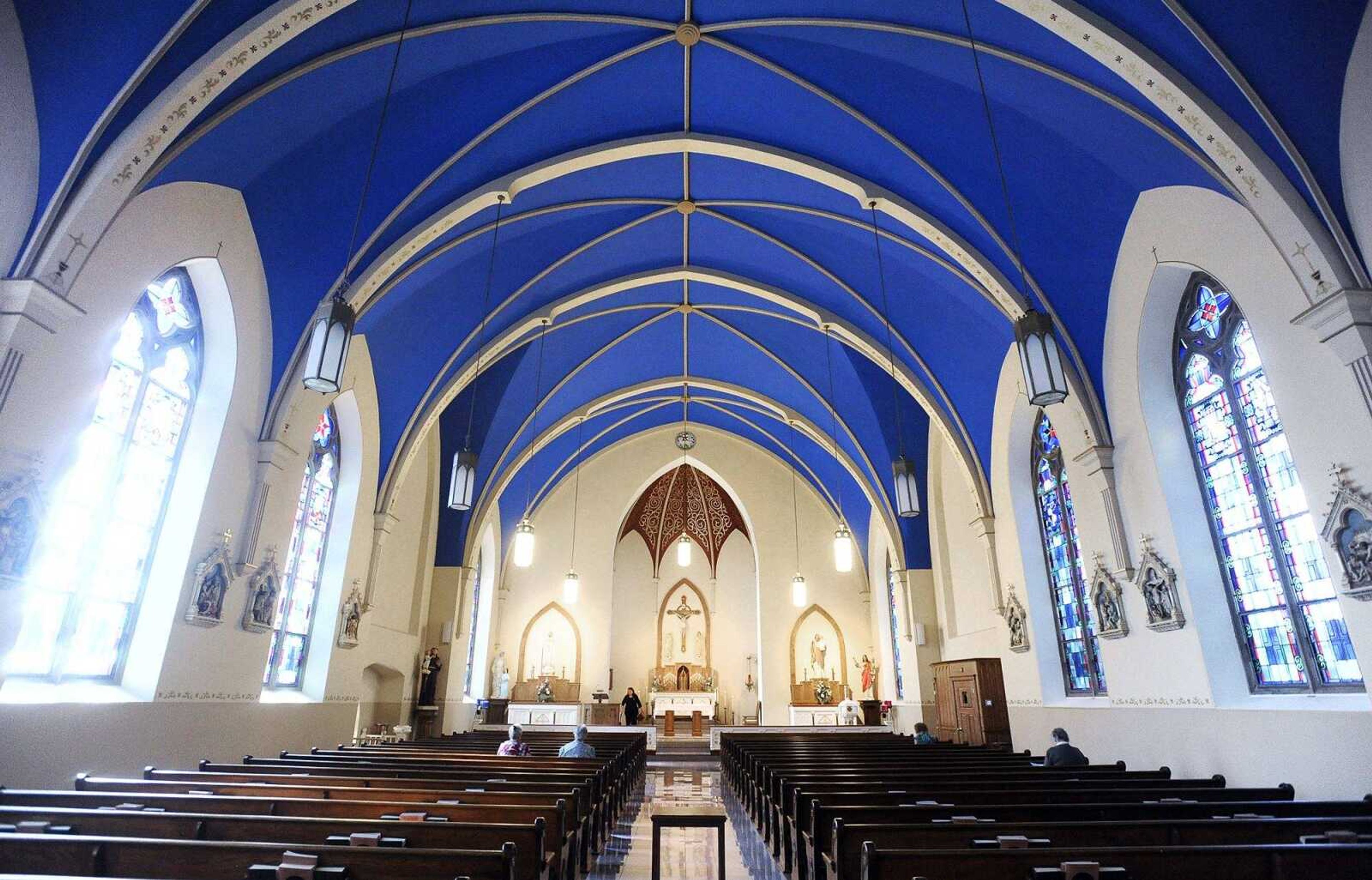 Parishioners check out their newly remodeled St. John's Catholic Church in Leopold, Missouri between masses on May 29.