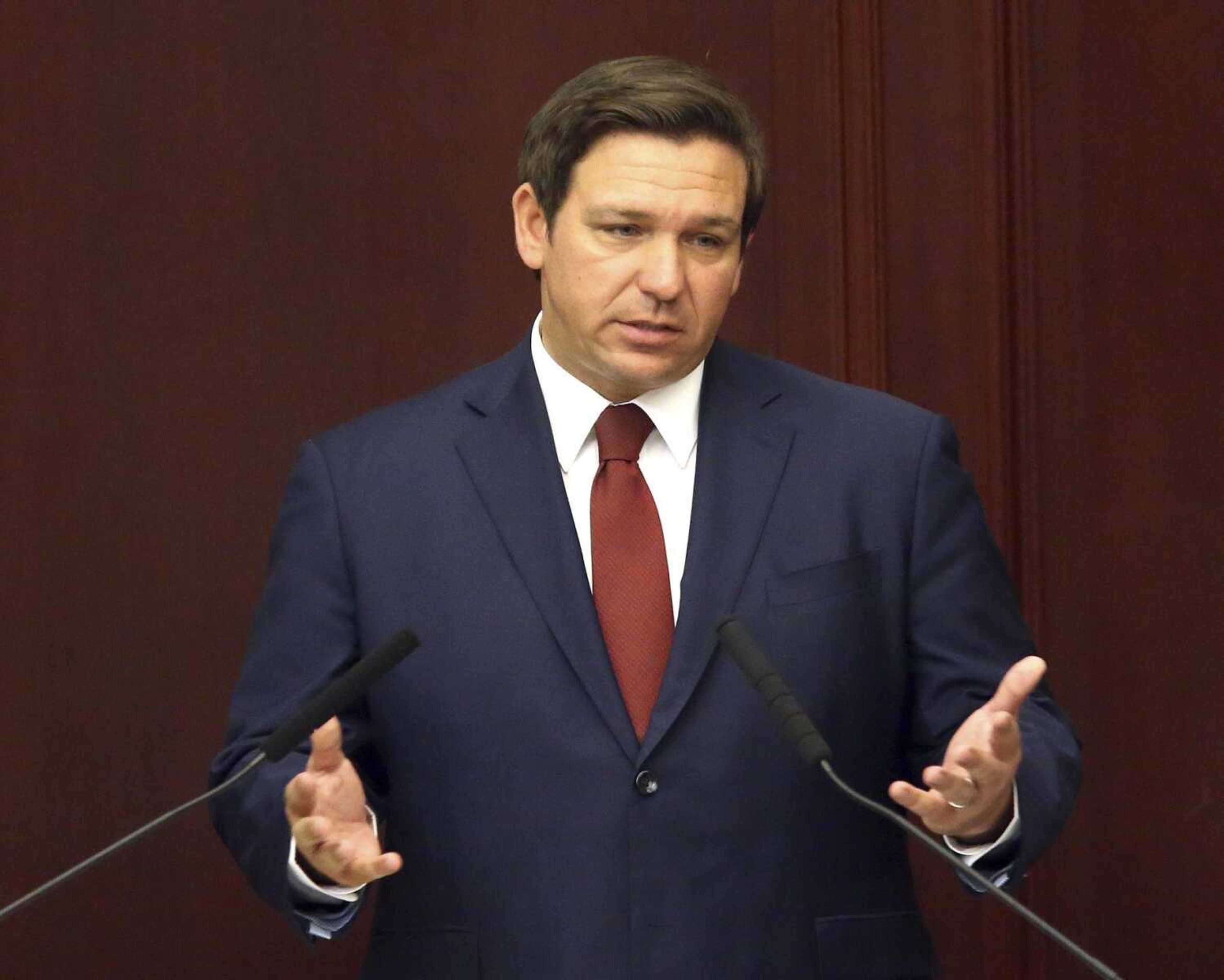 Florida Gov. Ron Desantis gives his state of the state address on the first day of legislative session in March in Tallahassee, Florida. DeSantis is going to Israel with a large contingent of business leaders and may hold a Cabinet meeting while there.