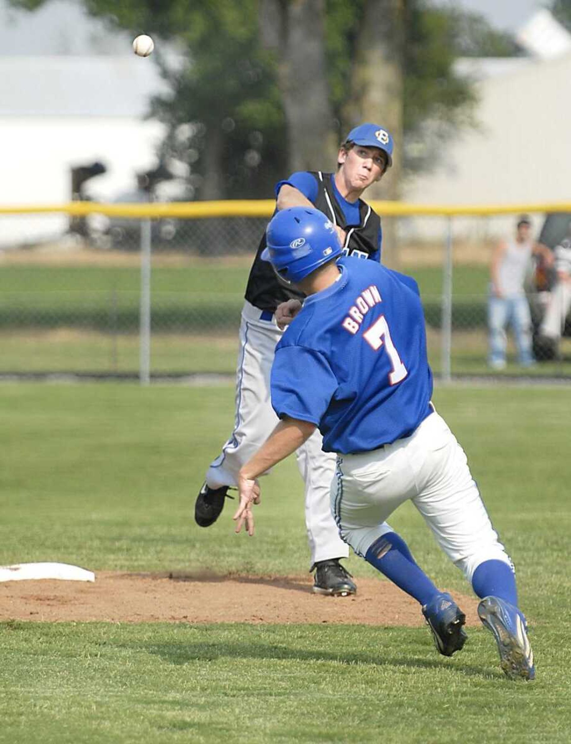 Oran second baseman Kody Campbell completed a double play over Cooter's Aaron Brown during Oran's 3-0 sectional win Wednesday in Cooter. (Kit Doyle)