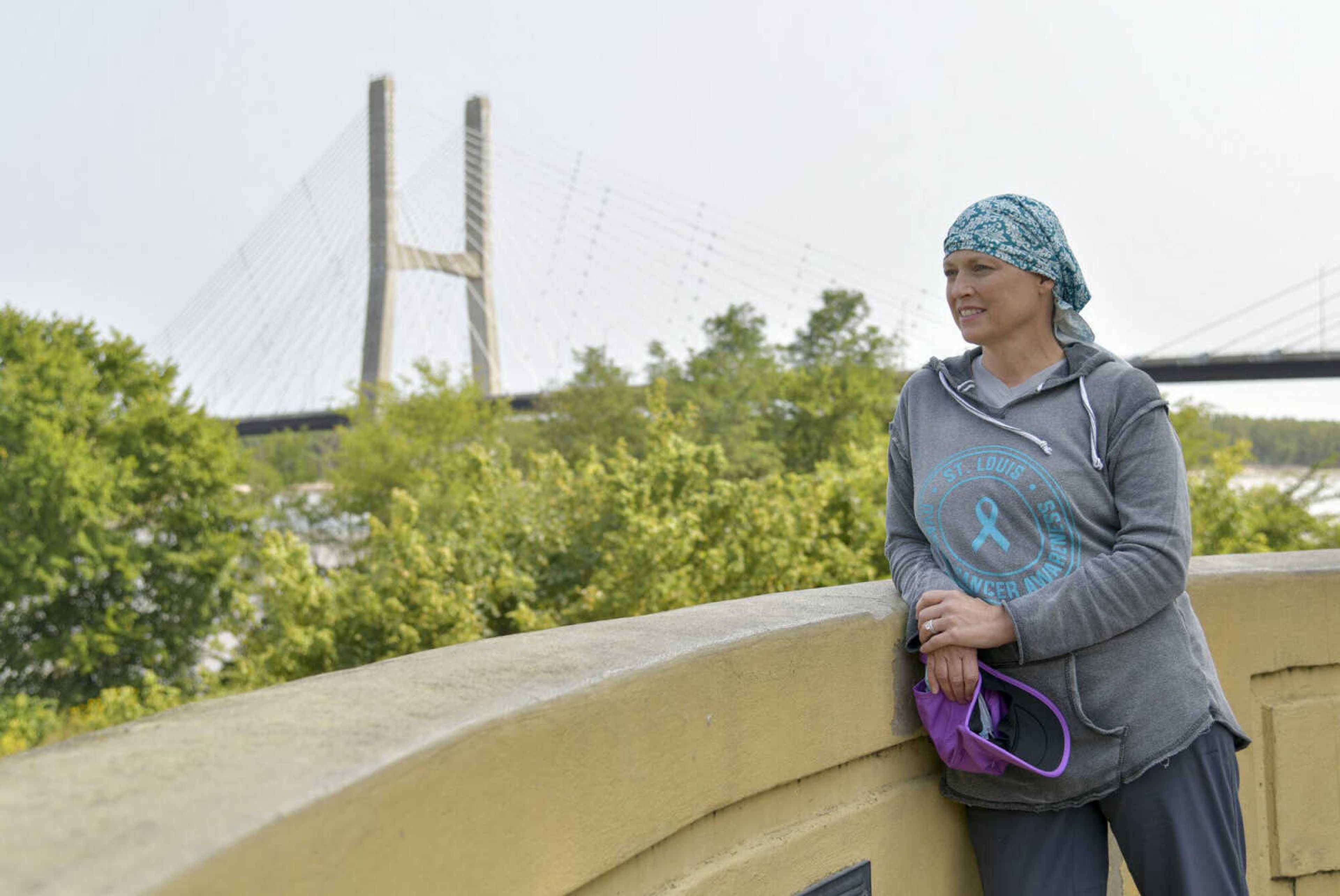 Sandi Essner looks out to view the Mississippi River at River Campus Park on Sept. 18.