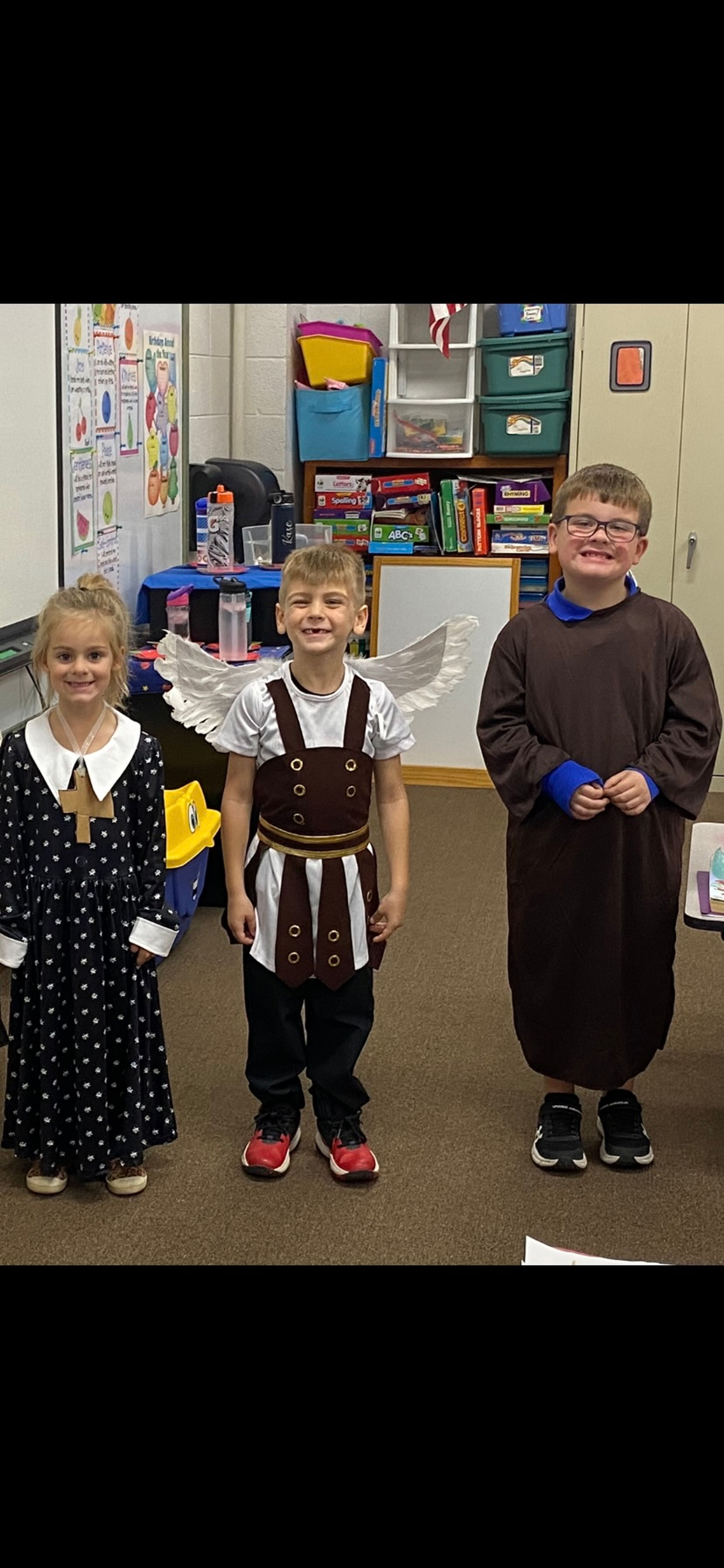 The students in Kindergarten who were saints were St. Francis of Assisi (Lincoln Henderson) (Not pictured), St. Joseph (Kase King), St. Michael the Archangel (Paxton Urhahn), & St. Elizabeth Ann Seton (Peyton Dirnberger).