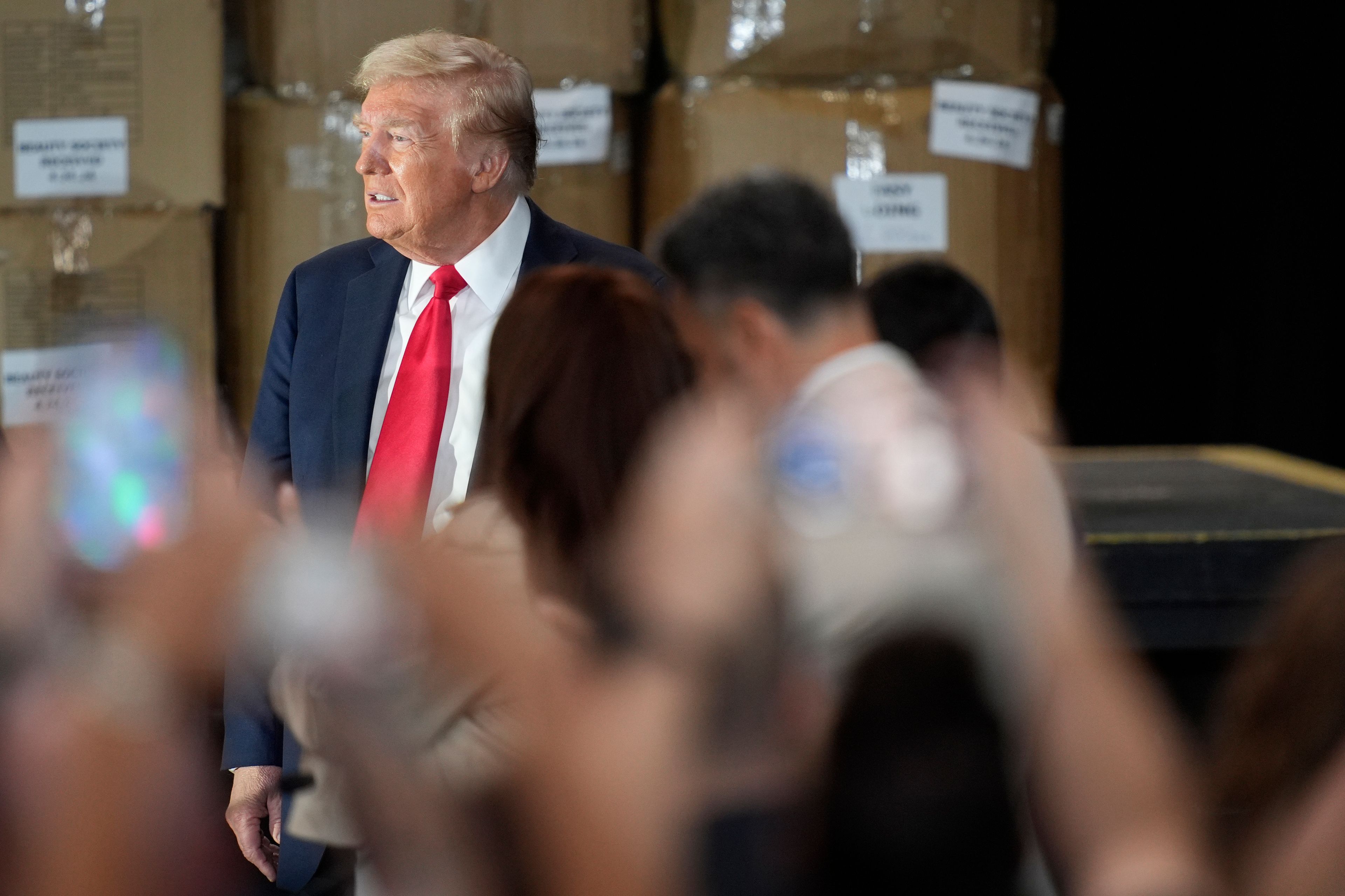 Republican presidential nominee former President Donald Trump arrives to speak at a campaign event at Beauty Society, Saturday, Oct. 12, 2024, in North Las Vegas, Nev. (AP Photo/John Locher)