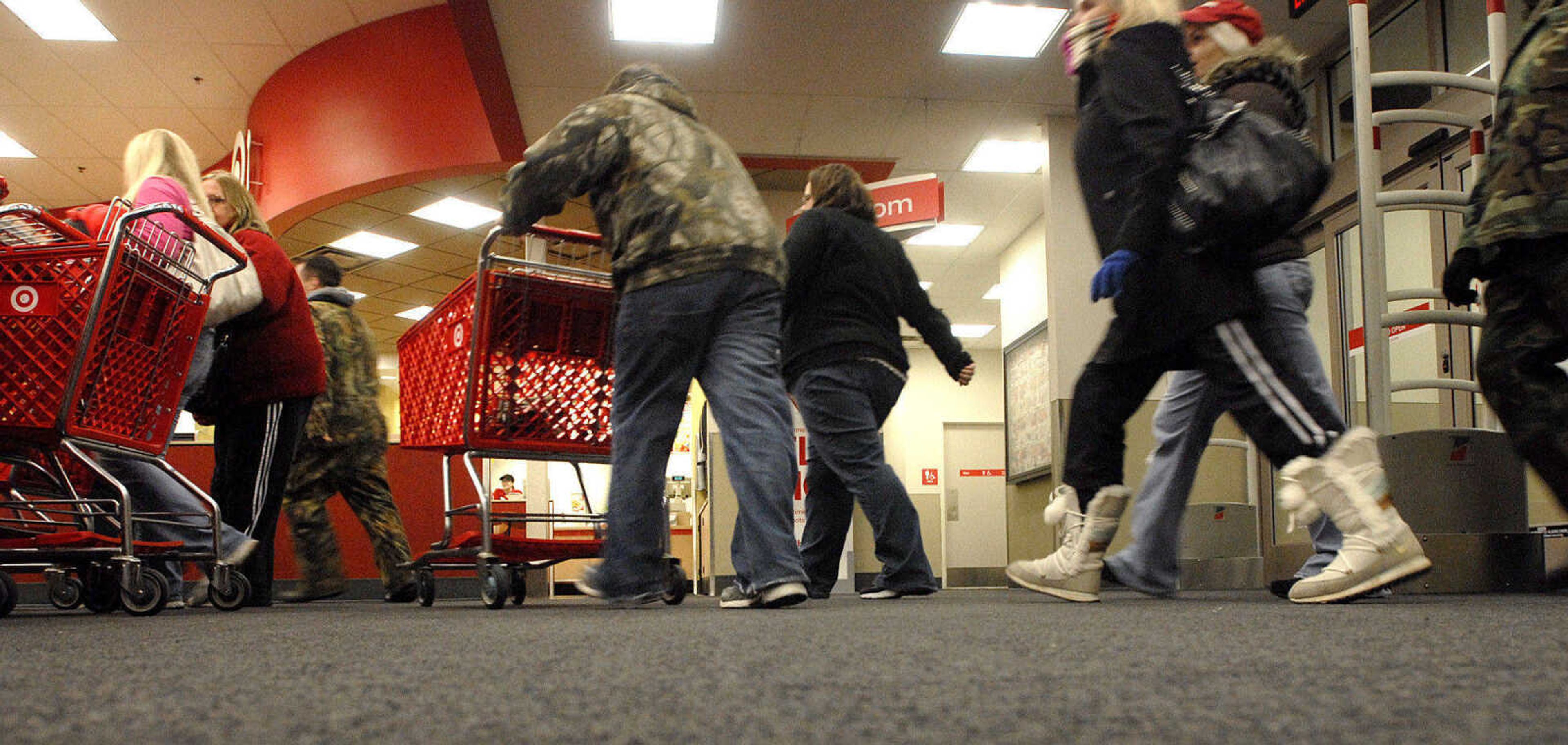 LAURA SIMON ~lsimon@semissourian.com
Black Friday shoppers make their way through Target in search of bargains just after midnight Friday, November 25, 2011 in Cape Girardeau.