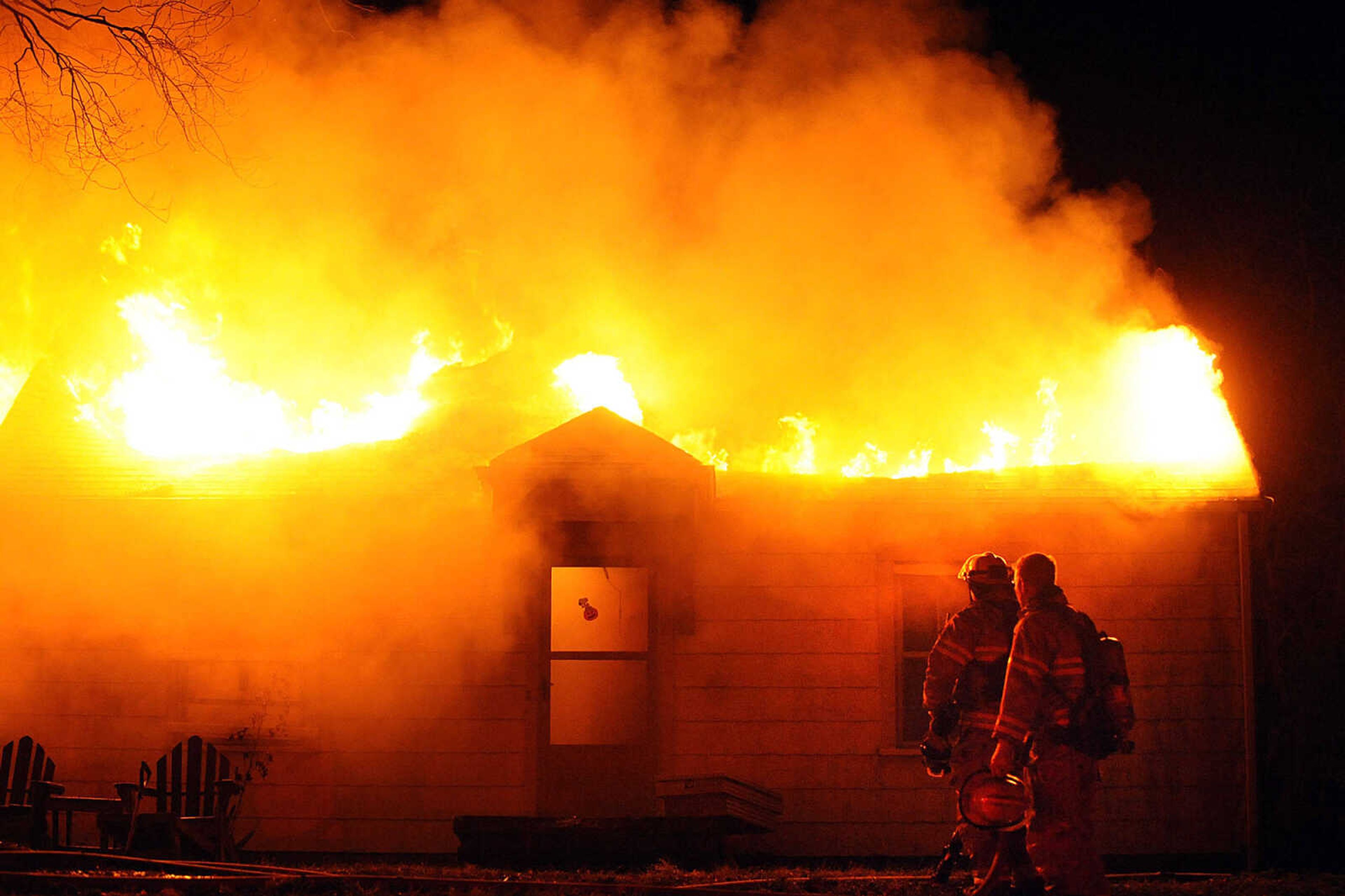 LAURA SIMON ~ lsimon@semissourian.com
Firefighters from Delta, Gordonville, Cape Girardeau, Millersville, Fruitland and East County Fire Departments battle a structure fire Wednesday night, January 9, 2012 on Onyx Lane in Cape Girardeau.