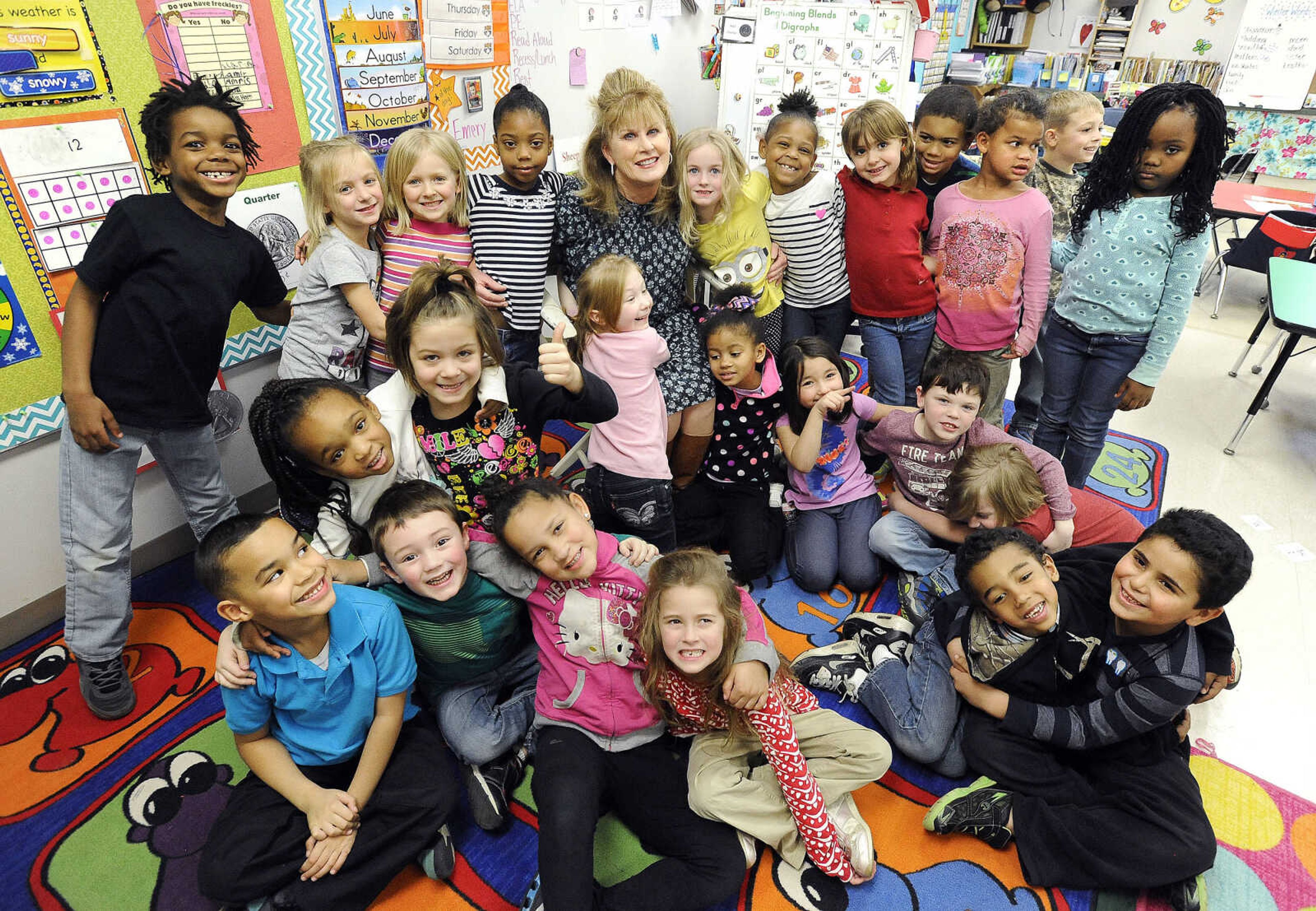 LAURA SIMON ~ lsimon@semissourian.com

Kindergarten students surround Blanchard Elementary principal, Barbara Kohlfeld, for a group photo, Monday, Feb. 8, 2016. The Cape Girardeau school was named a National Blue Ribbon School by the U.S. Department of Education.