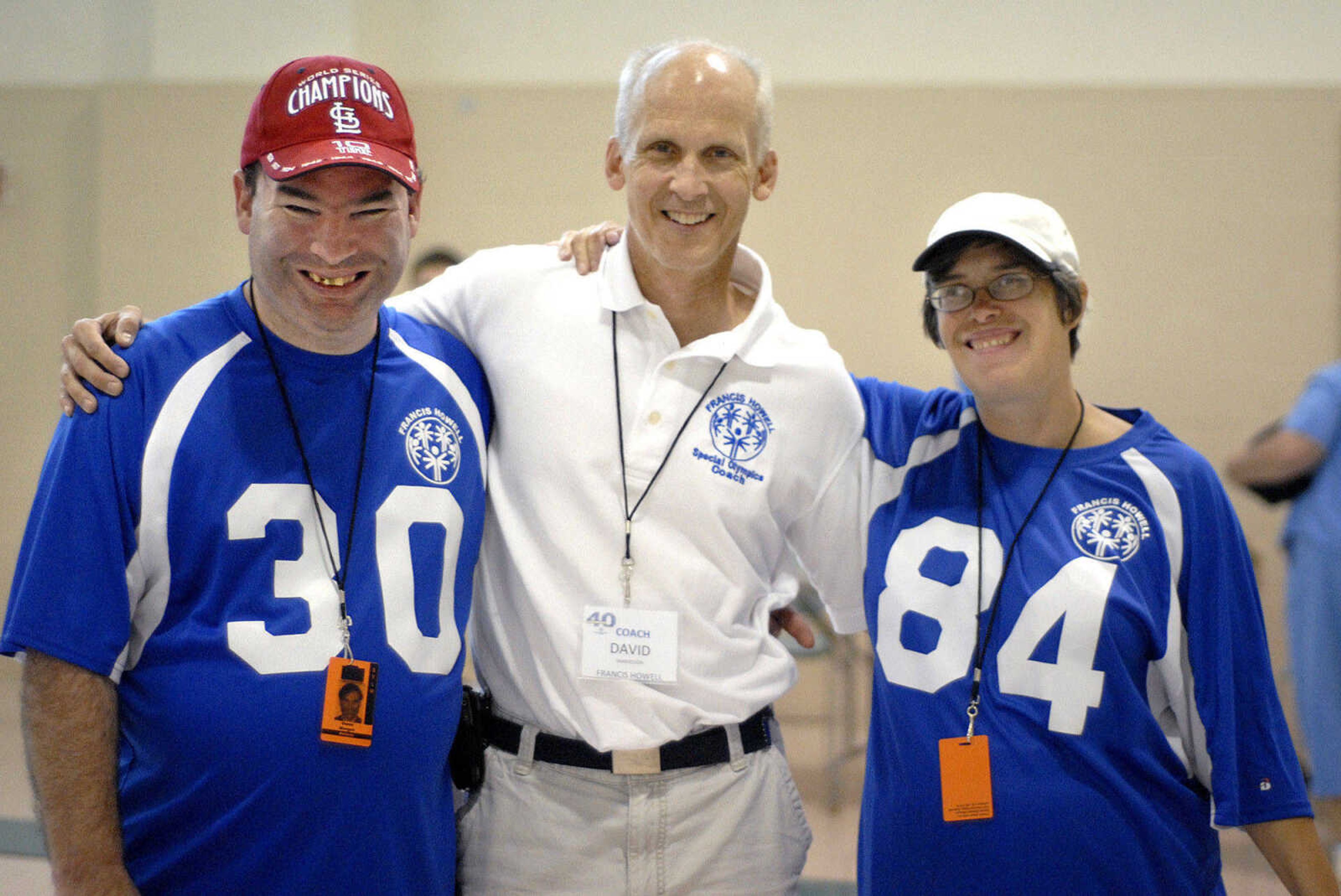 LAURA SIMON ~ lsimon@semissourian.com
Coach David Samuelson poses for a photo with members of his team Owen Meegan and Donna Wolf at Victory Village inside the the Osage Centre Saturday, August 13, 2011 in Cape Girardeau.