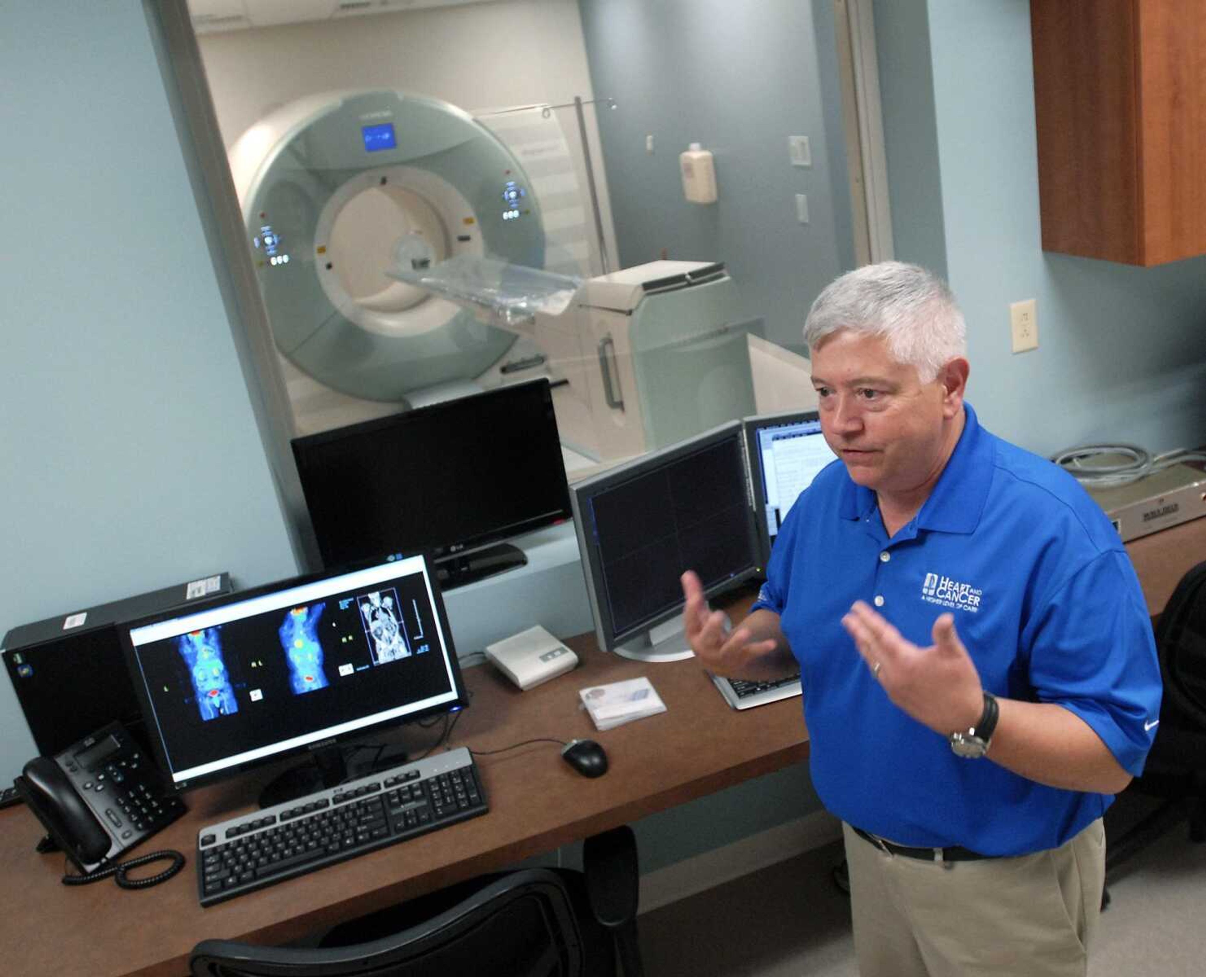 Vince Glueck, PET/CT technologist, talks about the new PET/CT facility at Saint Francis Medical Center in Cape Girardeau. On Saturday, Saint Francis held a construction crew and family open house for its Heart Hospital and Cancer Institute, which is scheduled to open in July. For more photos, visit semissourian.com. (Kristin Eberts)