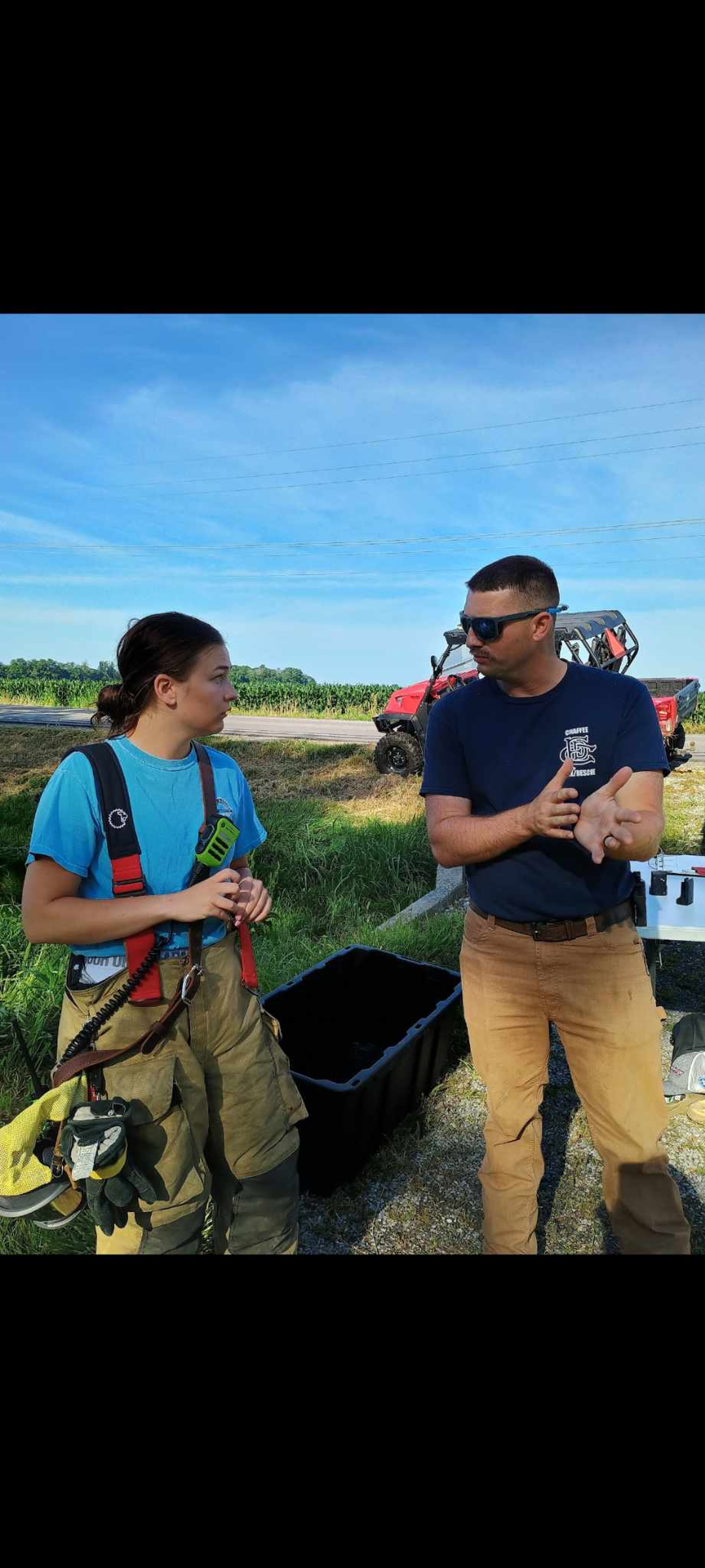 Cody Johnson talks with Maddy Glueck during a training session