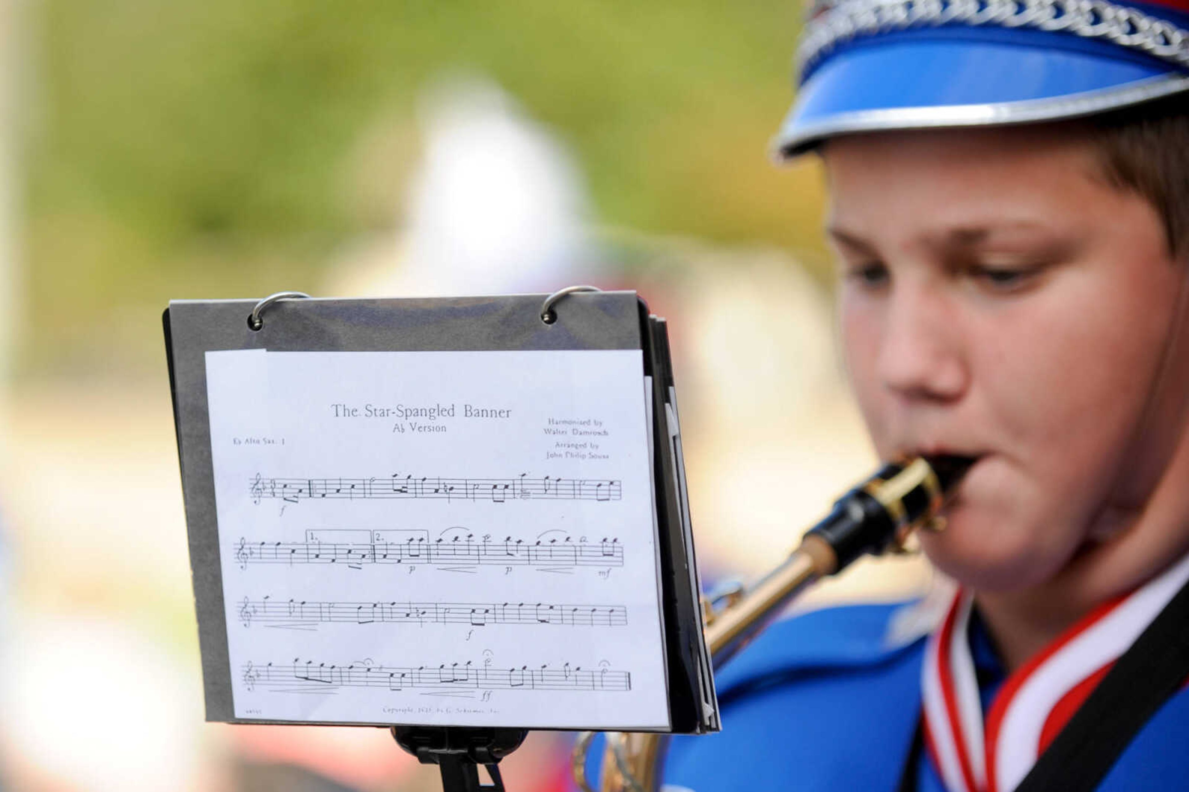 GLENN LANDBERG ~ glandberg@semissourian.com

A member of the Delta High School marching band play a song while moving through Uptown Jackson during the Jackson Band Festival parade Tuesday, Oct. 6, 2015.