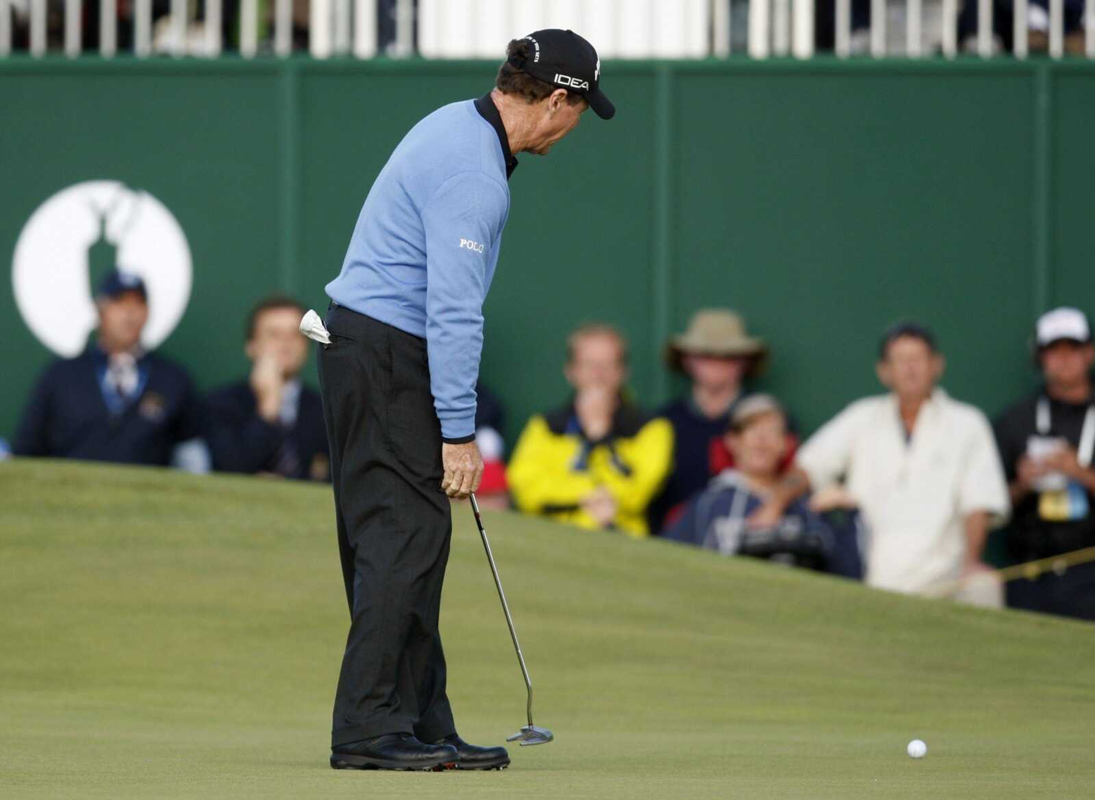 Tom Watson misses a putt on the 18th green Sunday during the final round of the British Open. He would have won the tournament if he had made the putt. (PETER MORRISON ~ Associated Press)