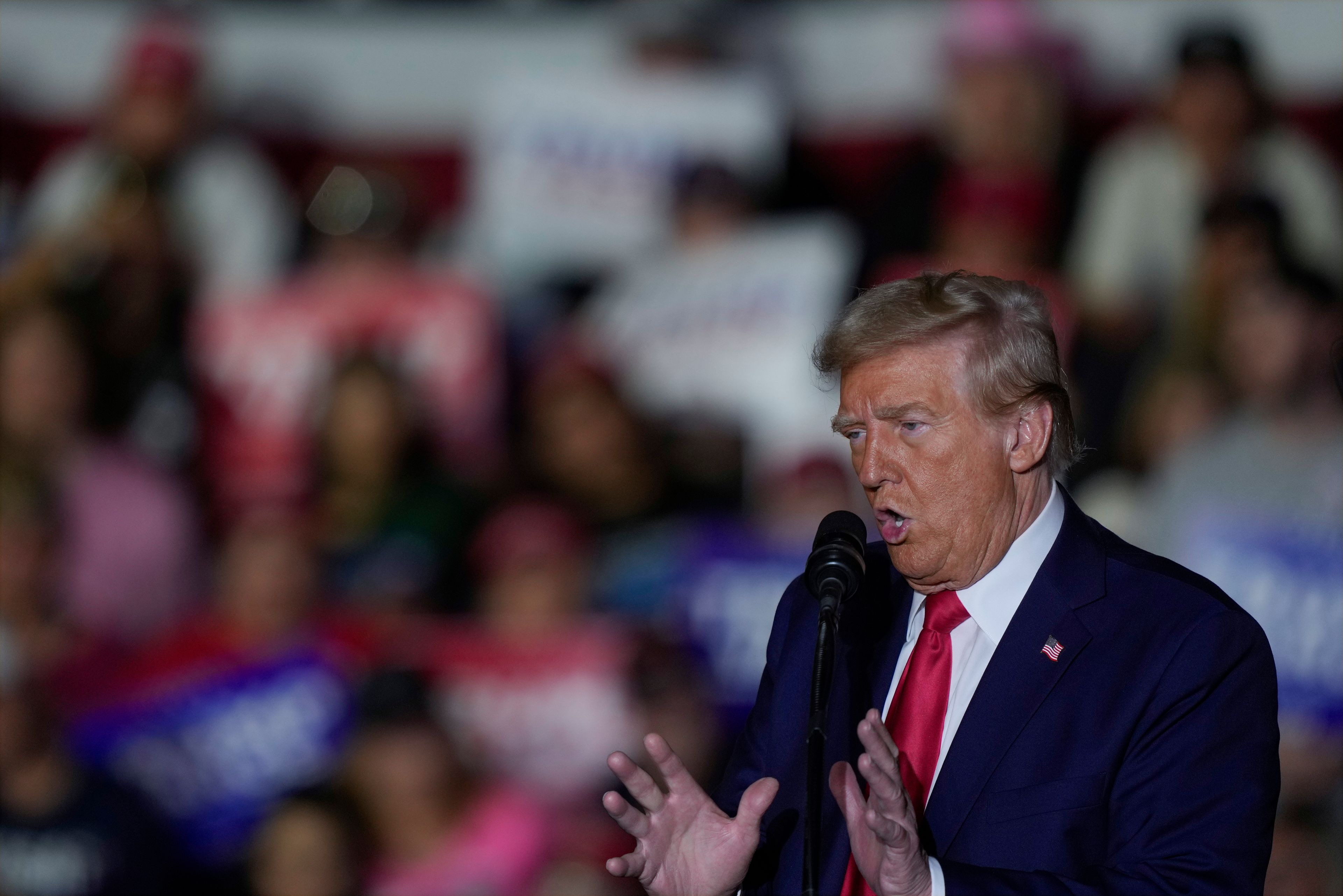 Republican presidential nominee former President Donald Trump speaks at a campaign rally at Williams Arena at Mignes Coliseum, Monday, Oct. 21, 2024, in Greenville, N.C. (AP Photo/Julia Demaree Nikhinson)