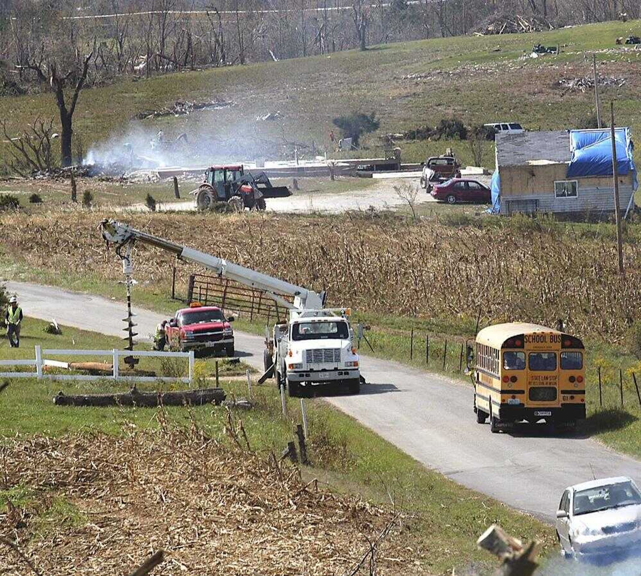 Students of Saxon Lutheran High School go back to Cape Girardeau in their school bus after spending the day clearing trash and debris caused by a tornado last Friday for the residents of Crosstown, Wednesday, Sept., 27, 2006. (DIANE L. WILSON &#149; dlwilson@semissourian.com)