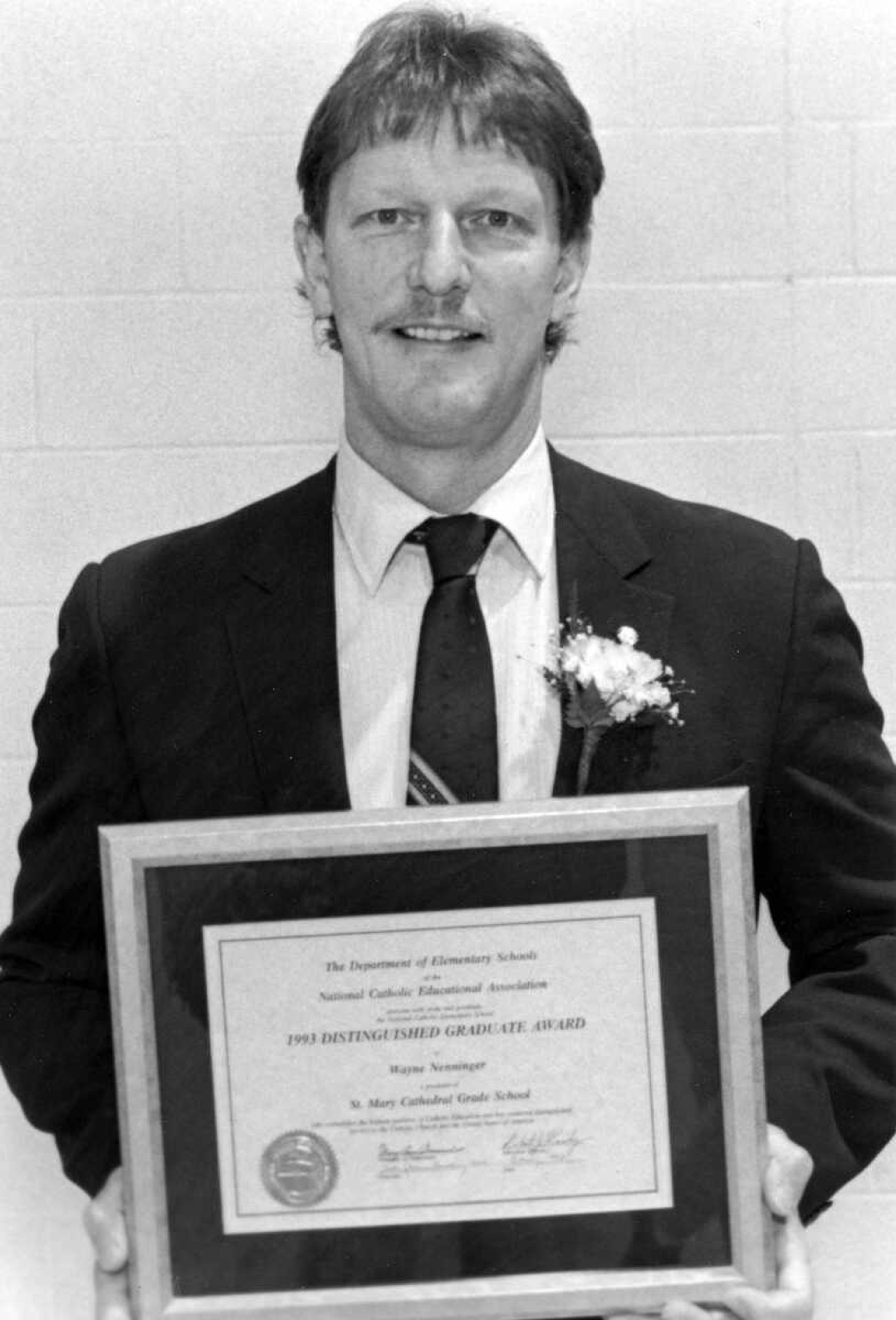 Published Feb. 2, 1993.
Wayne Nenninger, a teacher at Notre Dame High School for 23 years, was presented the 1993 Distinguished Graduate Award from St. Mary Cathedral School Monday. Nenninger, who attended St. Mary, was presented the award for his distinguished service to the Catholic church and Catholic education. Nenninger teachers civics, history, economics, social studies and psychology. (Don Shrubshell ~ Southeast Missourian archive)