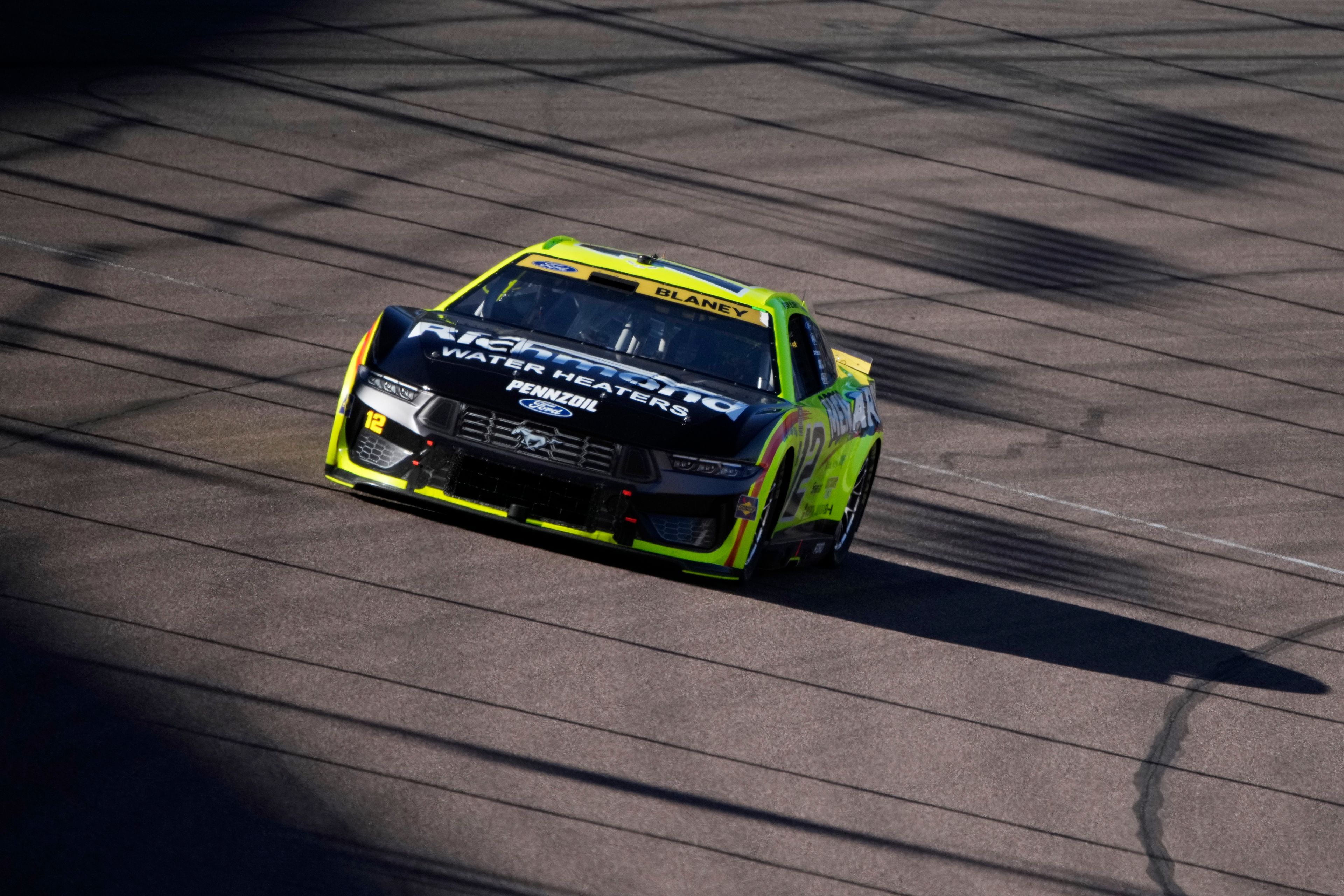 Ryan Blaney (12) drives during a NASCAR Cup Series Championship auto race at Phoenix Raceway, Sunday, Nov. 10, 2024, in Avondale, Ariz. (AP Photo/John Locher)