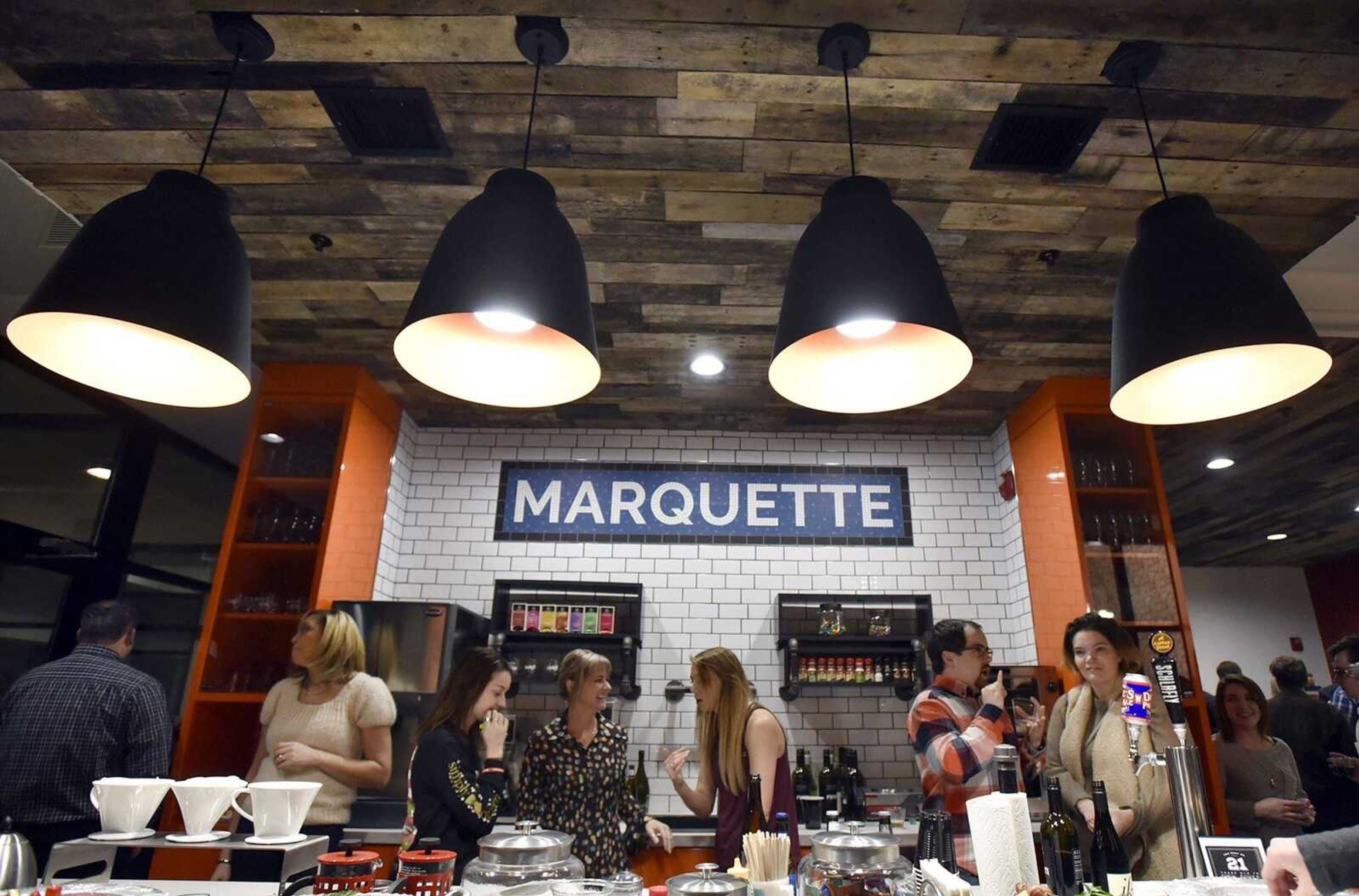 Visitors get a glimpse of the new Codefi location inside the Marquette Tower during its grand-opening party Tuesday in Cape Girardeau.