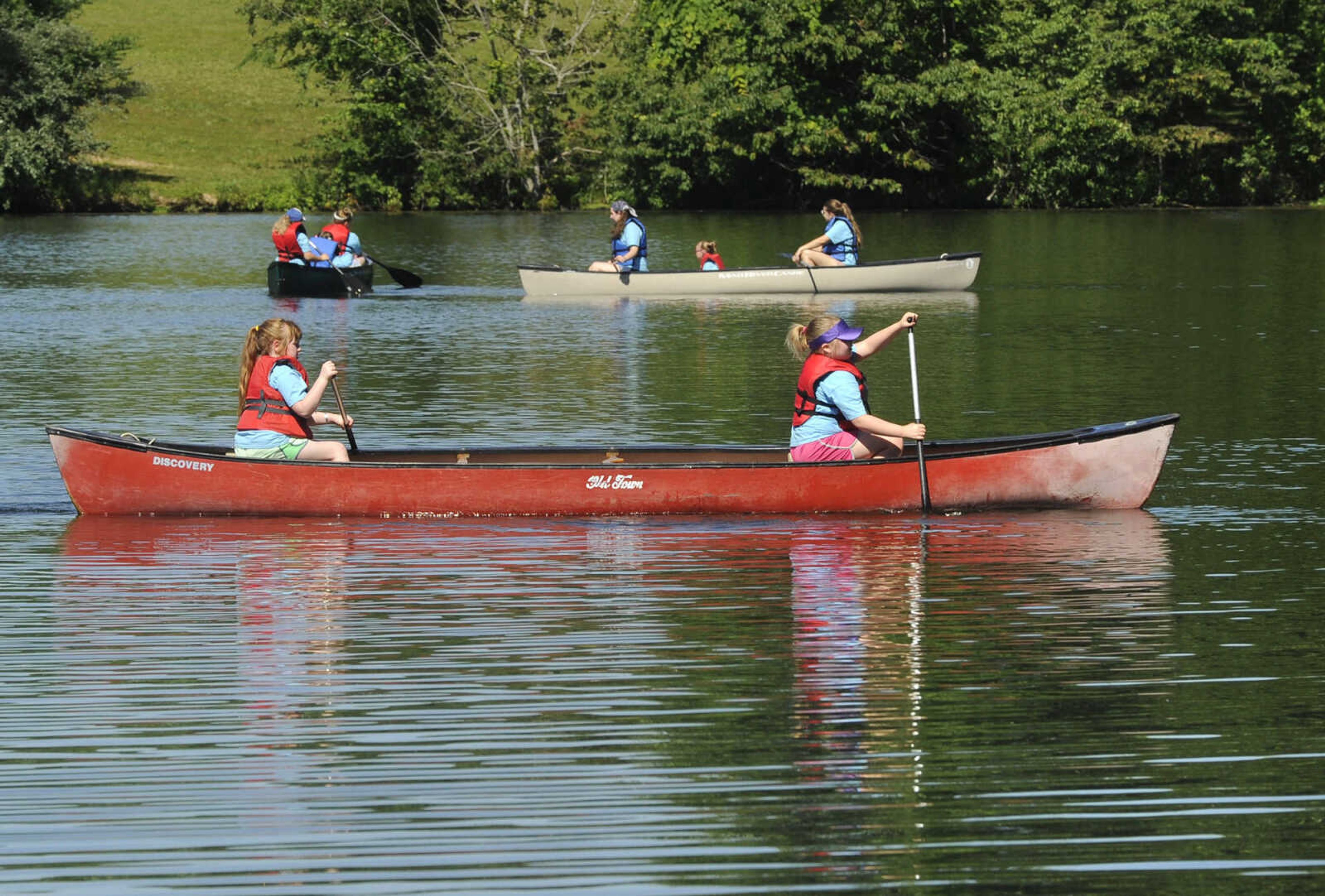 FRED LYNCH ~ flynch@semissourian.com
Brownie Girl Scouts paddle canoes Thursday, June 8, 2017 during Girl Scout day camp at Elks Lake in Cape Girardeau.