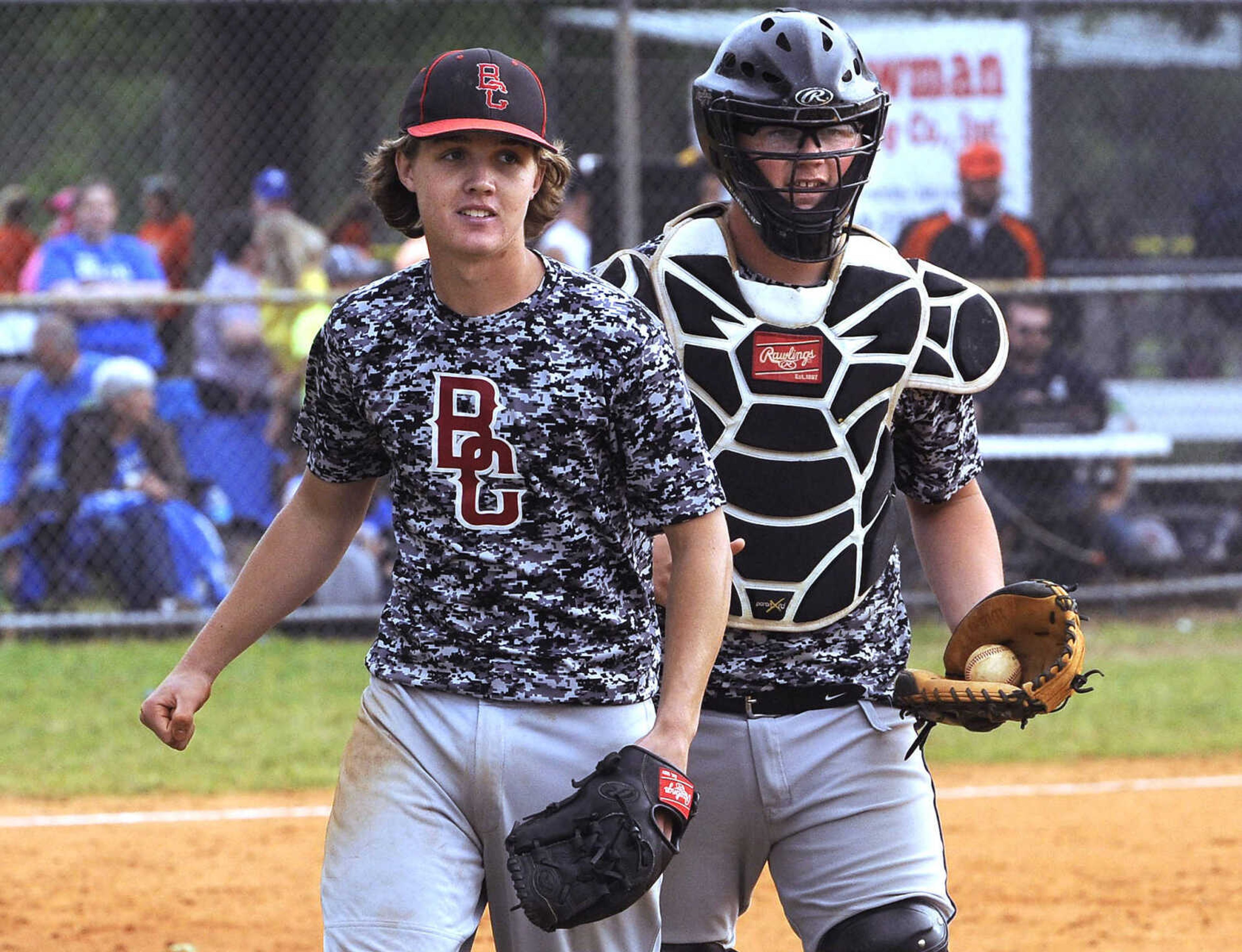 Bell City pitcher Austin Hicks and catcher Bobby Wright react after their 4-1 win over Oran in the Class 1 District 2 championship game Thursday, May 19, 2016 in Advance, Missouri.