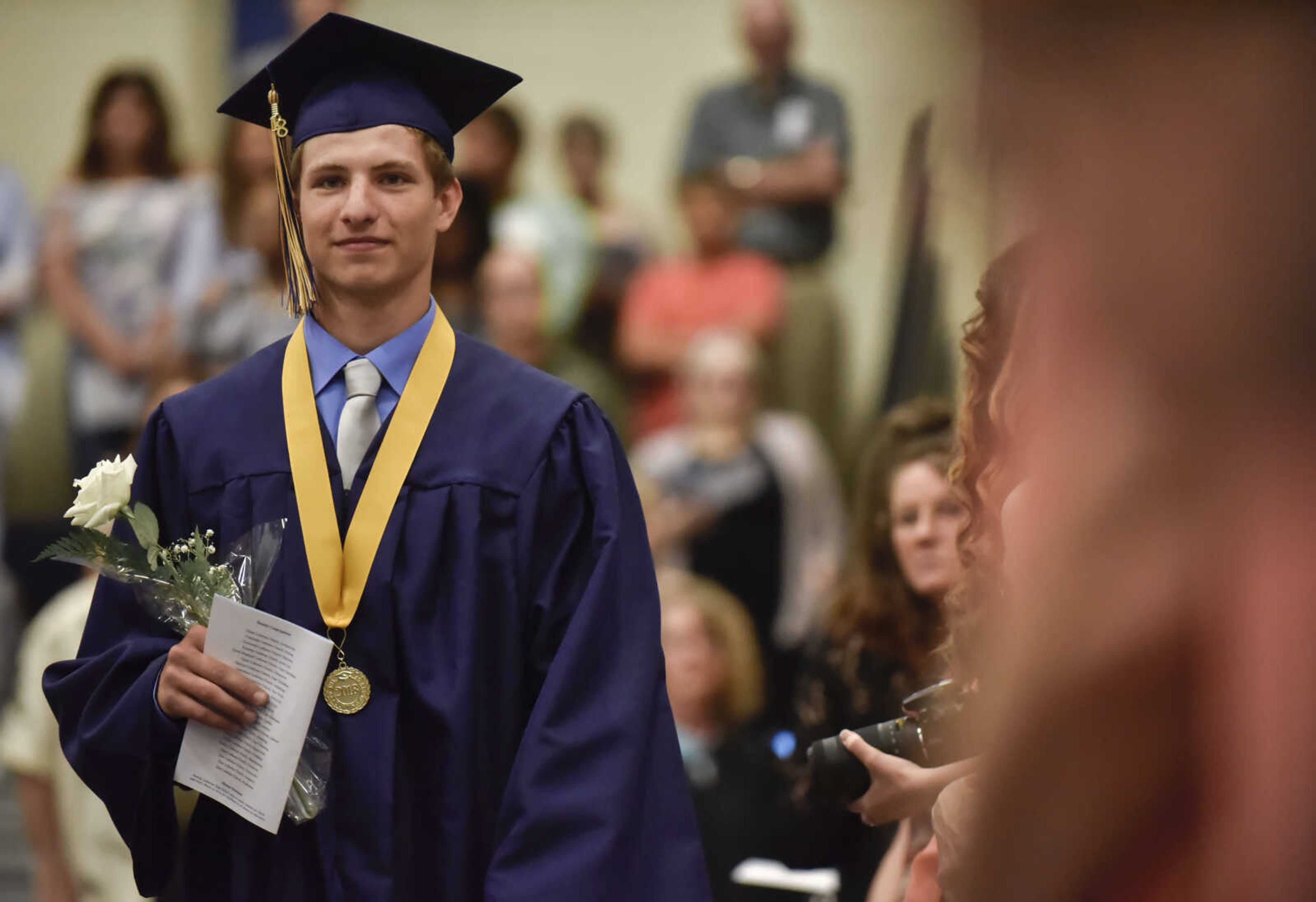 Graduates walk into their graduation ceremony Sunday, May 20, 2018 at Saxony Lutheran High School in Jackson.