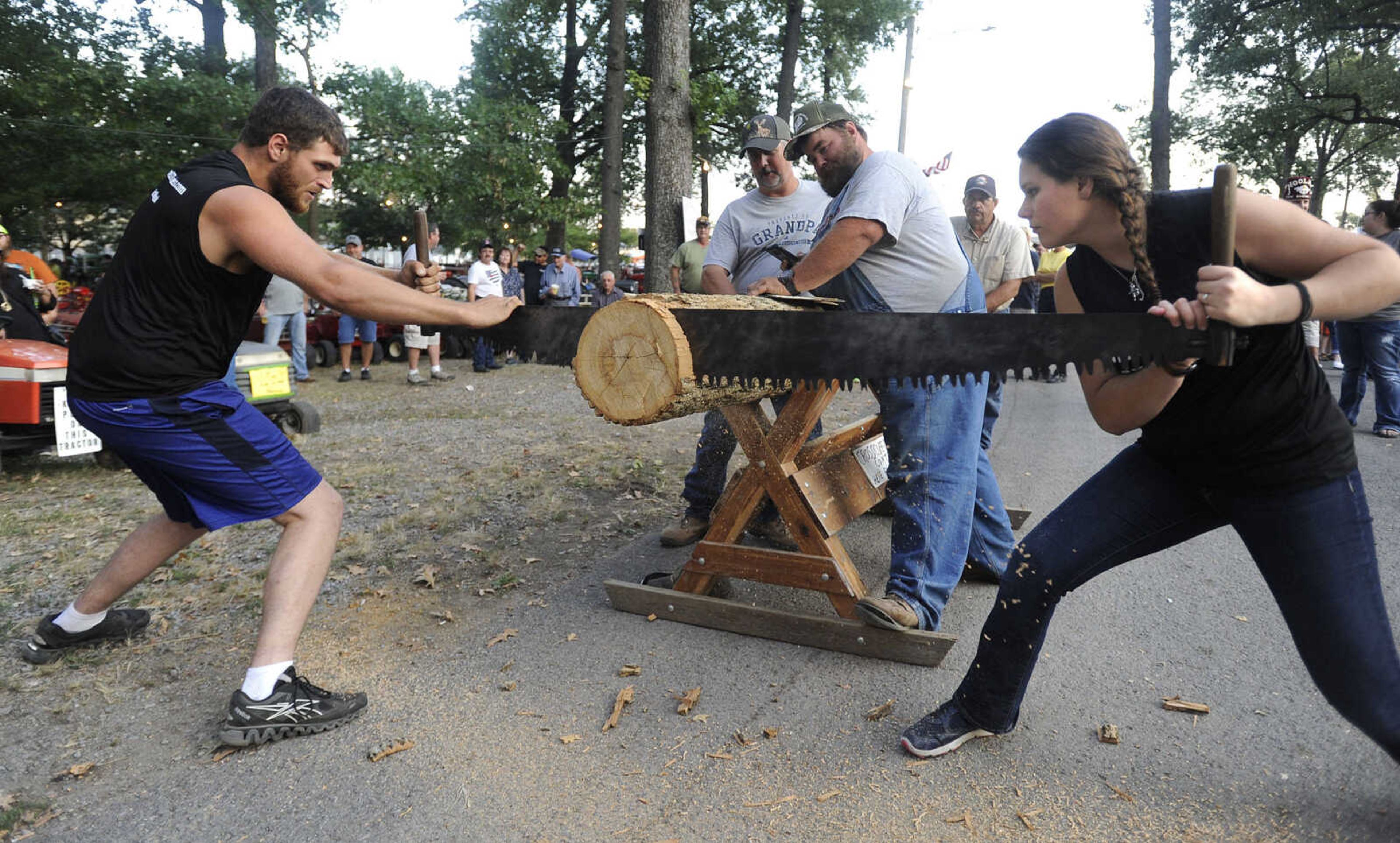 FRED LYNCH ~ flynch@semissourian.com
Aaron Hovis and Alyssa Hovis compete in the cross-cut saw event Friday, Sept. 15, 2017 at the SEMO District Fair in Cape Girardeau. The team placed third with a cut in 33.63 seconds.