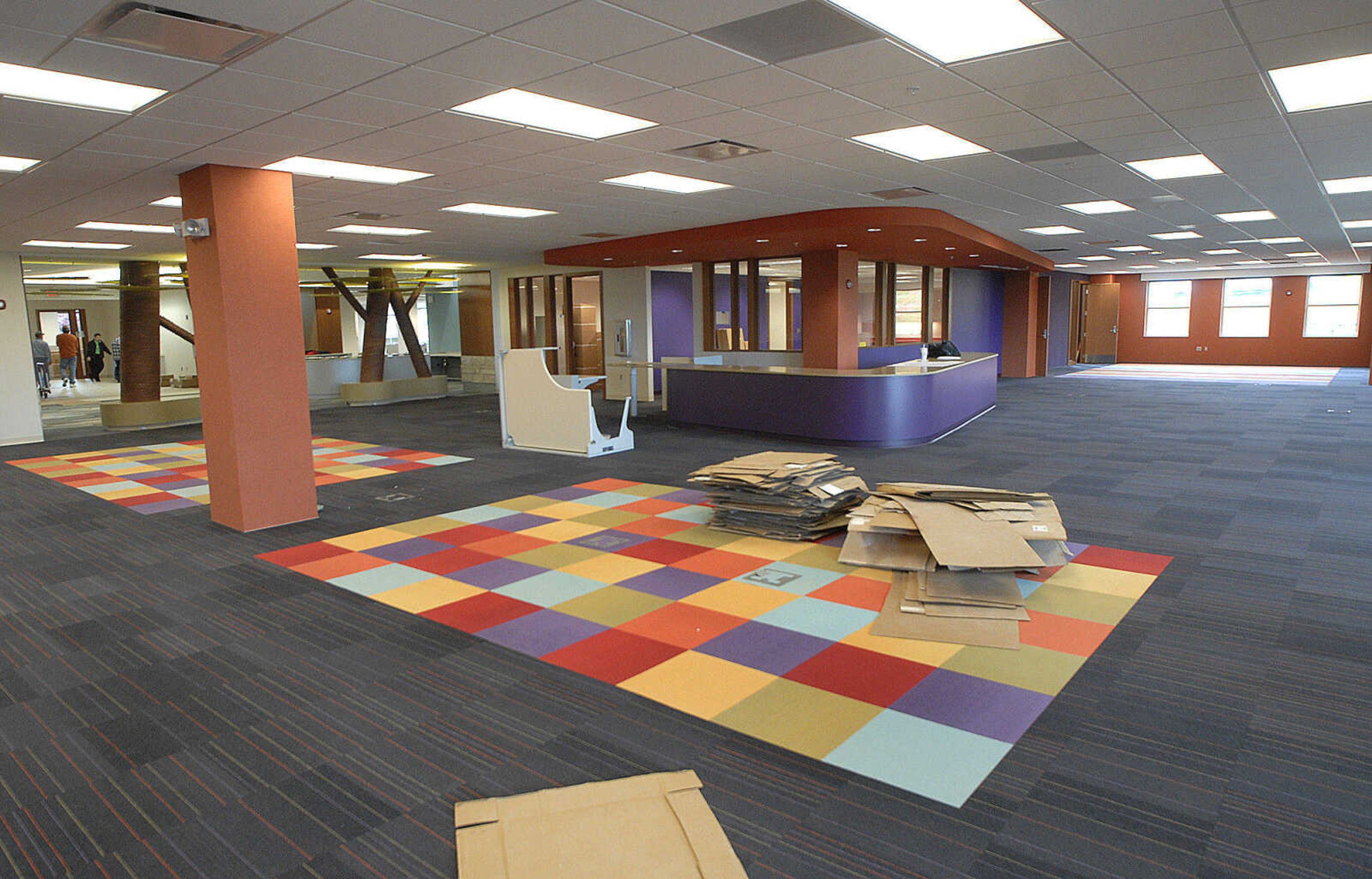 The children's area is accented with color in the new library.