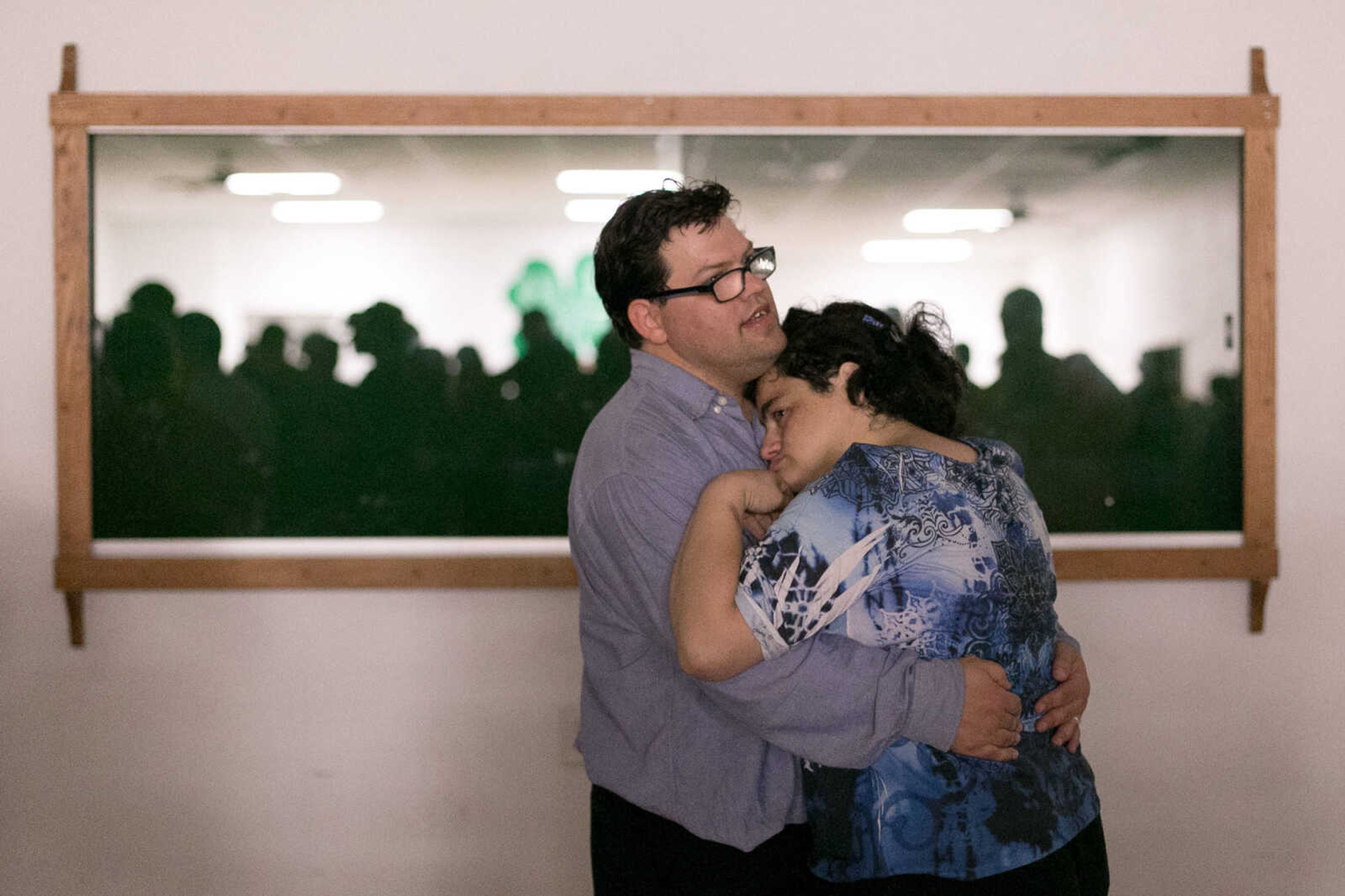 GLENN LANDBERG ~ glandberg@semissourian.com

Troy and Lisa Spain share a slow dance after requesting "I Swear" by All-4-One, their first dance song from their wedding six months ago, during the S.T.A.R. program Barnyard Dance in the 4-H Building in Arena Park Thursday, Nov. 19, 2015. S.T.A.R. is a community therapeutic recreation program serving individuals with special needs.