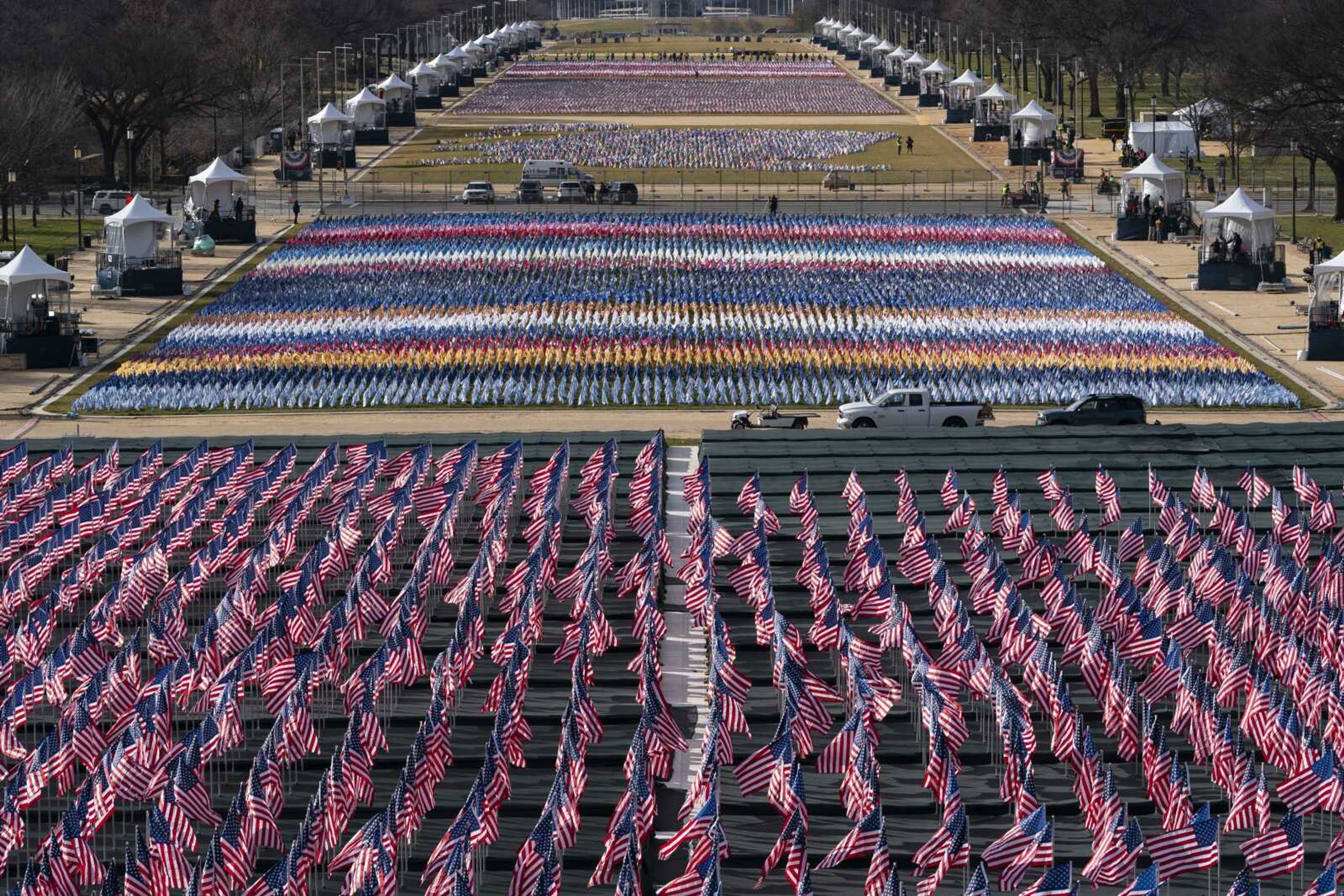 Flags are placed on the National Mall on Monday ahead of the inauguration of President-elect Joe Biden and Vice President-elect Kamala Harris in Washington.