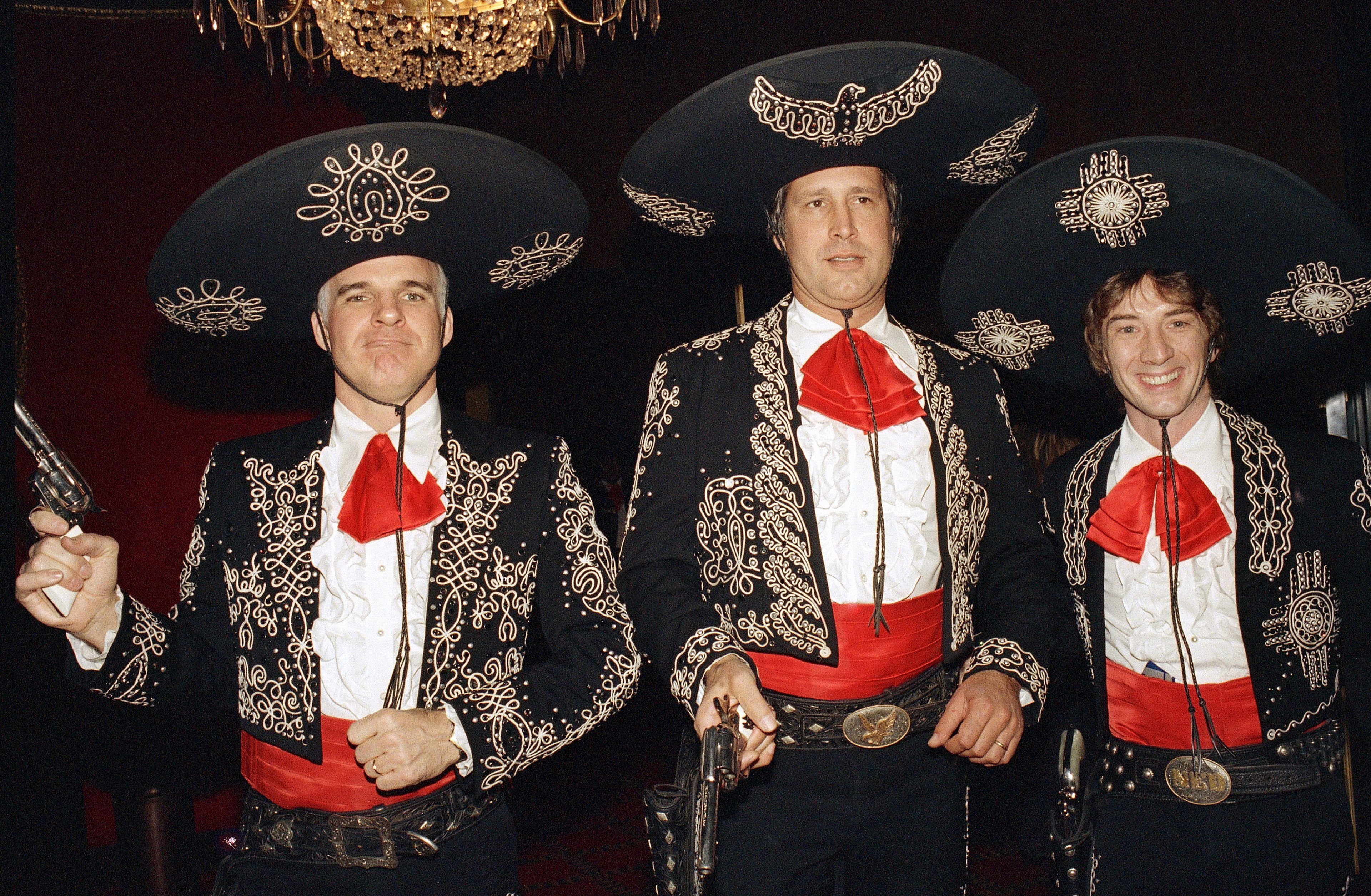 FILE - Steve Martin, from left, Chevy Chase, and Martin Short appear at the premiere of their film "Three Amigos!" in New York on Dec. 9, 1986. (AP Photo/Frankie Ziths, File)