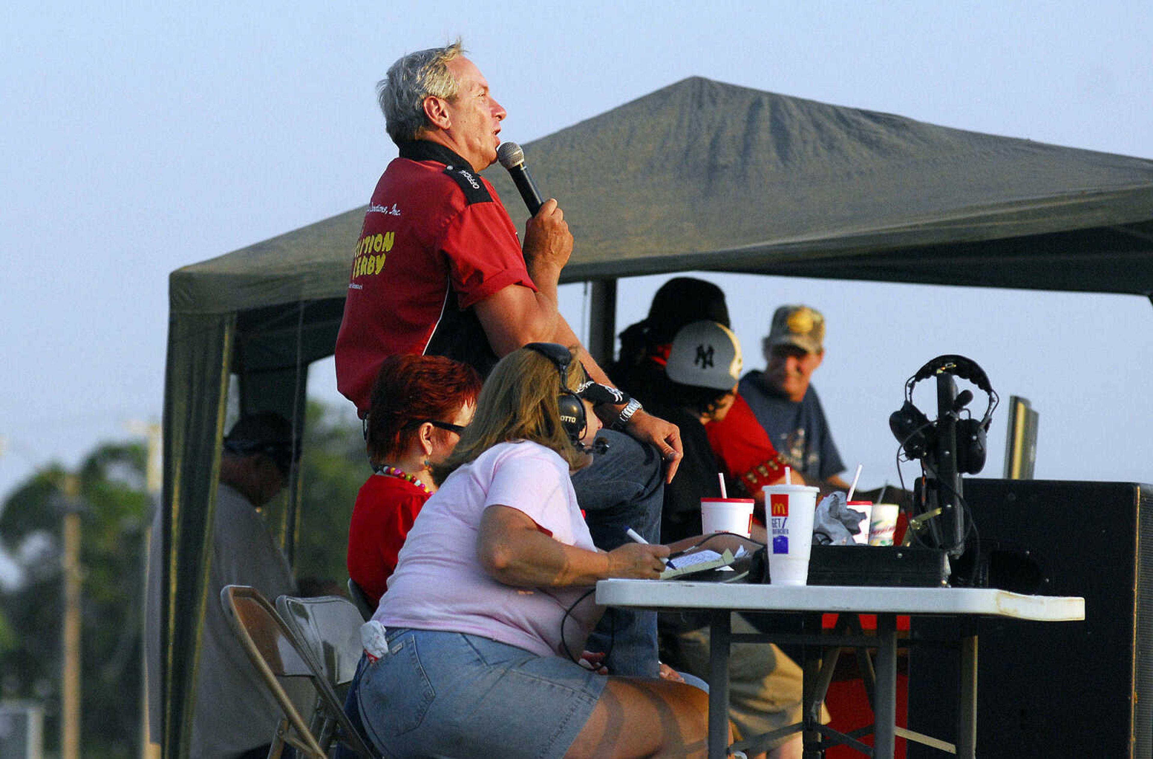 LAURA SIMON~lsimon@semissourian.com
Rick Sinclair takes the role of announcer at Dual Demolition Derby during the U.S.A. Veterans Fourth of July celebration at Arena Park in Cape Girardeau Sunday, July 4, 2010.