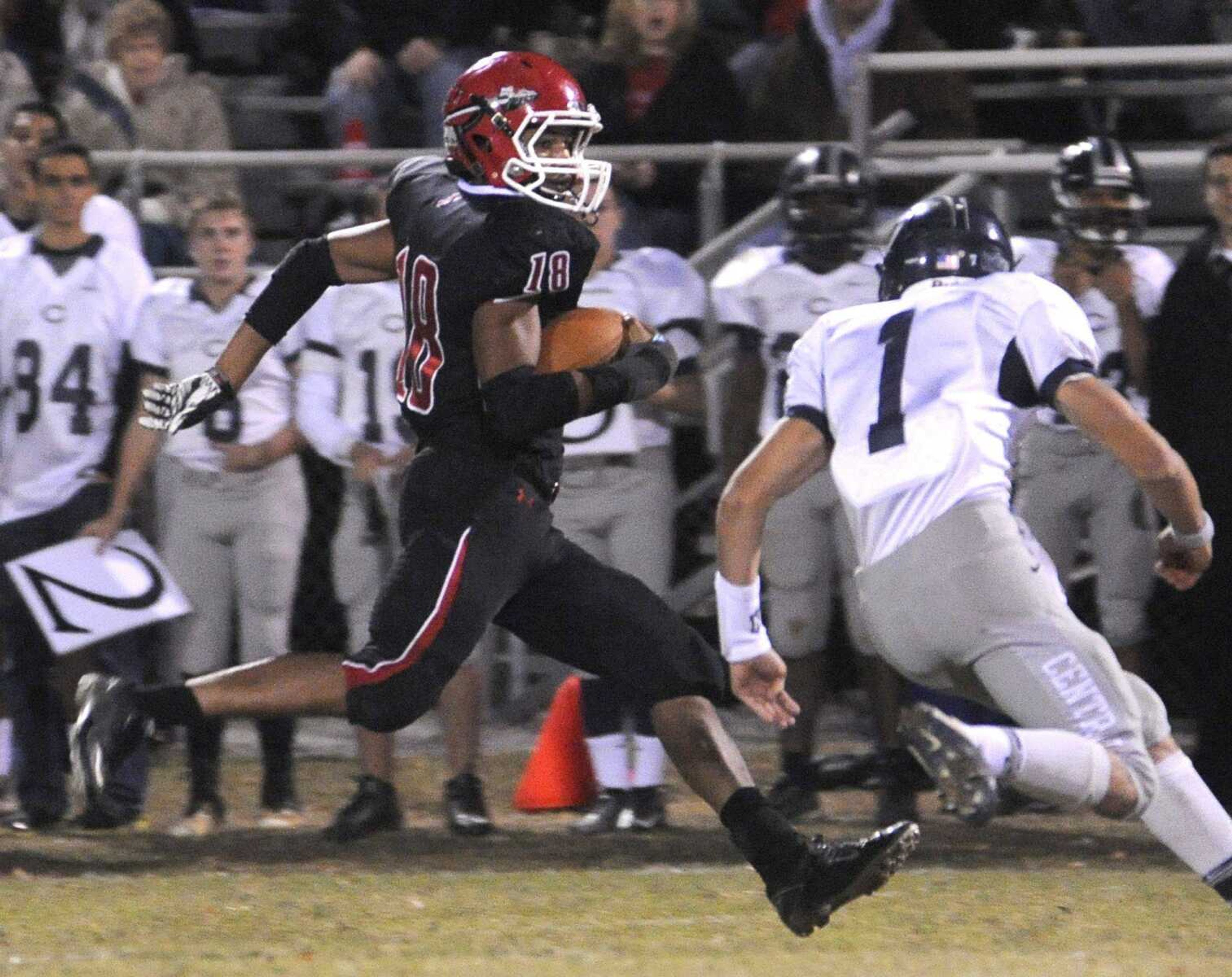 Jackson's Trea Forbs carries the ball against Francis Howell Central's Brody Allen during the second quarter Friday, Oct. 19, 2012 in Jackson. (Fred Lynch)