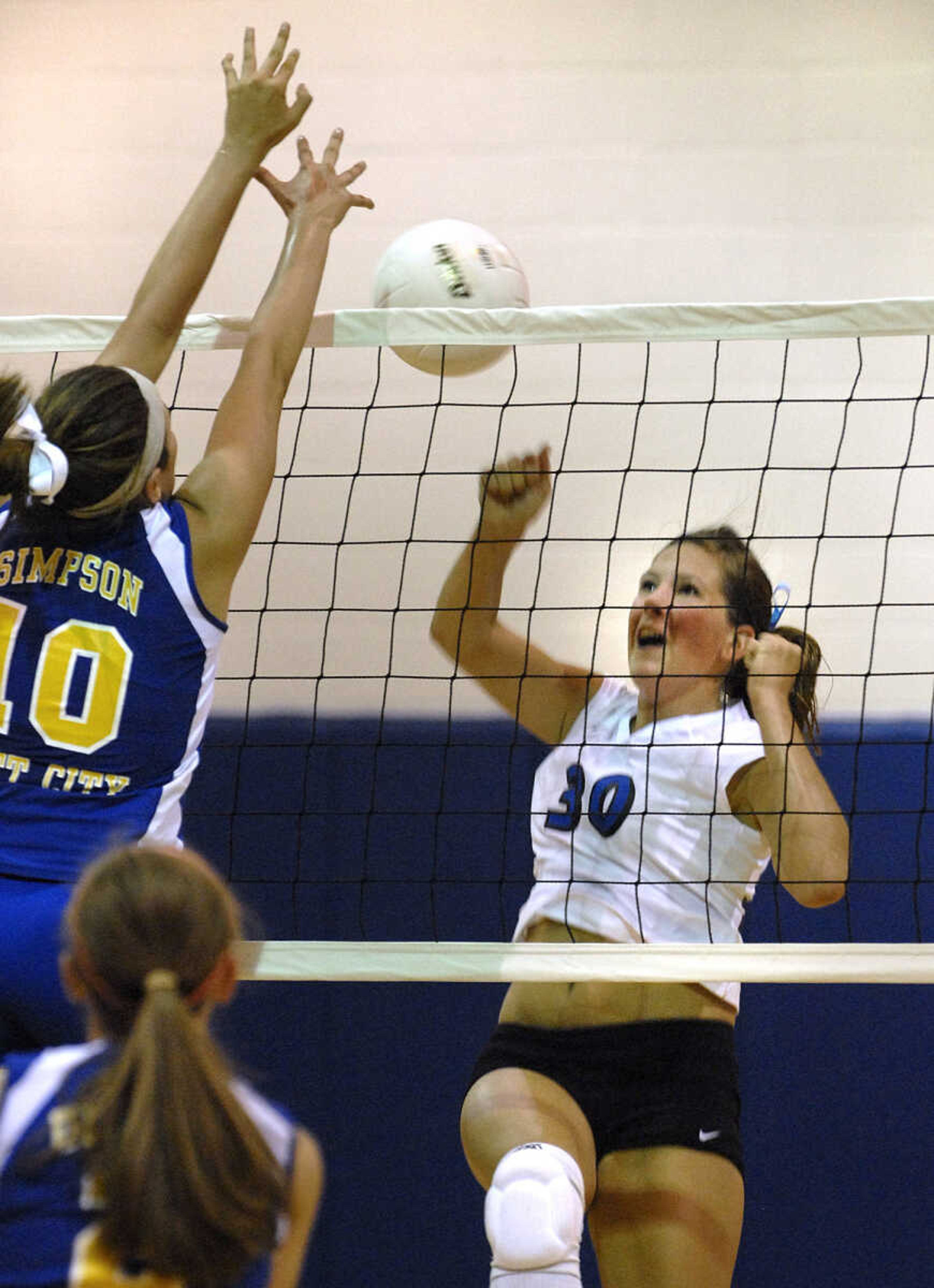 FRED LYNCH ~ flynch@semissourian.com
Scott City's Brooke Simpson, left, blocks a shot by Notre Dame's Meghan Dohogne during the first game Wednesday at Scott City.