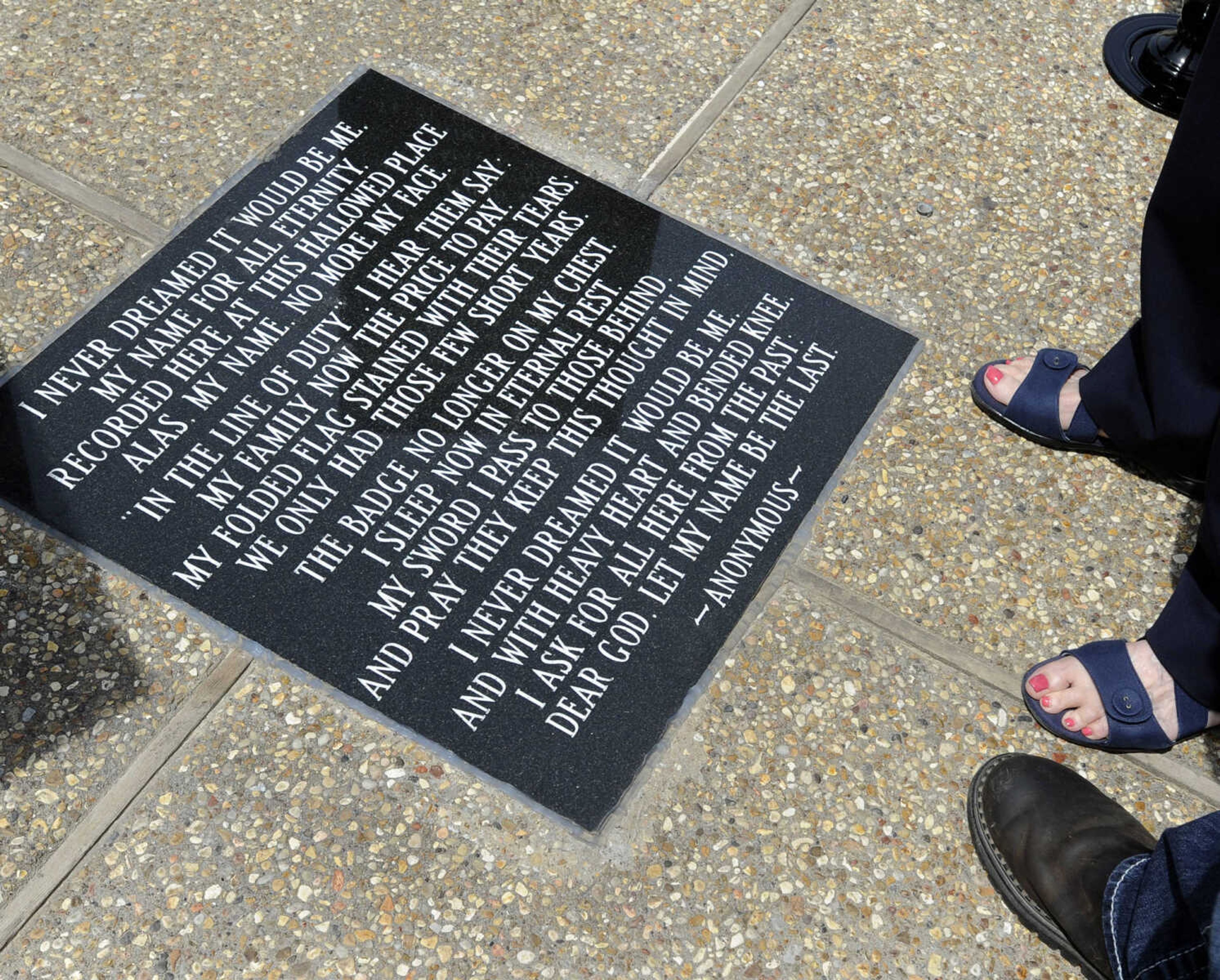 Visitors view the law enforcement monument at Cape Girardeau County Park North.