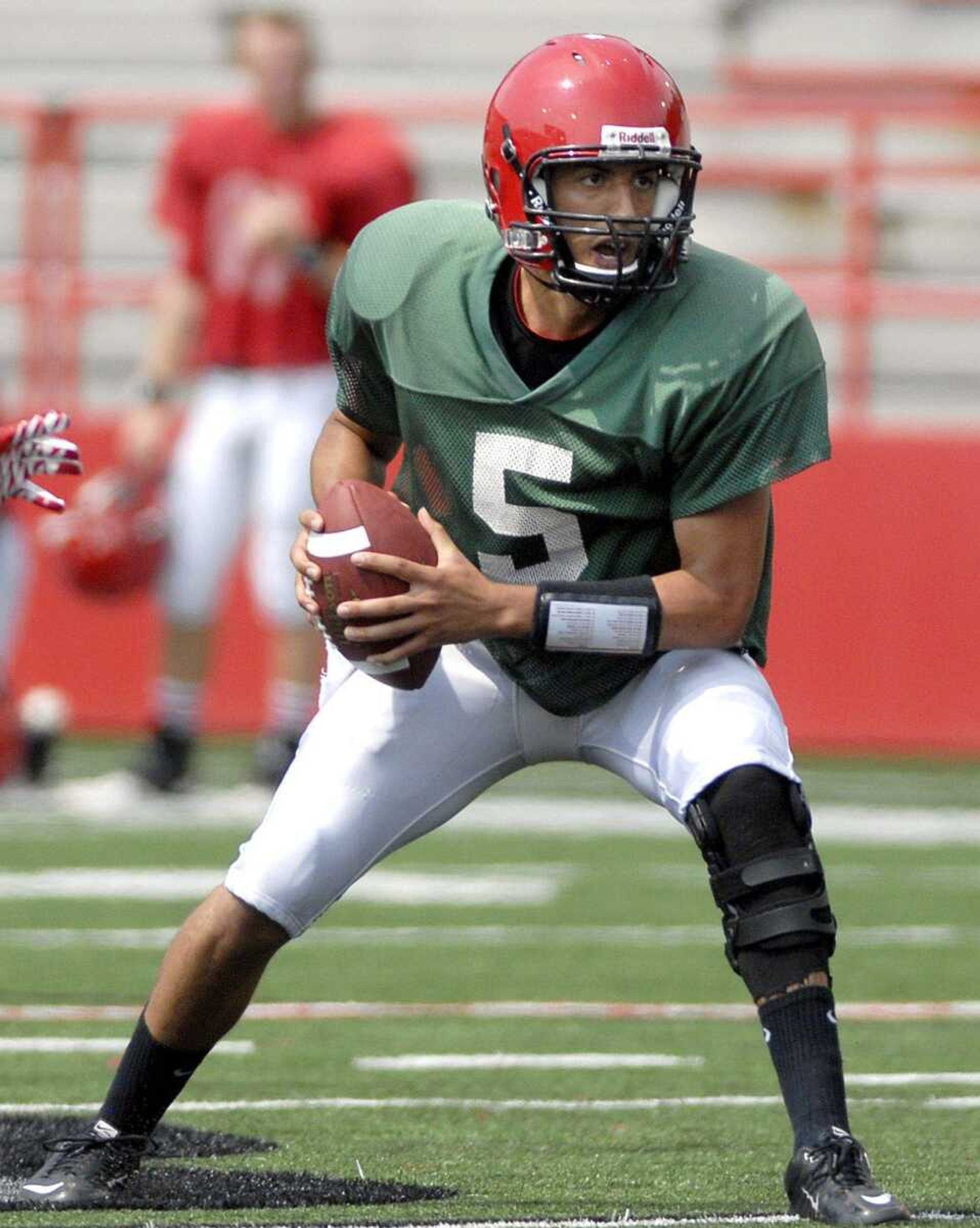 Southeast Missouri State quarterback Tyler Peoples handles a snap during Saturday's scrimmage.