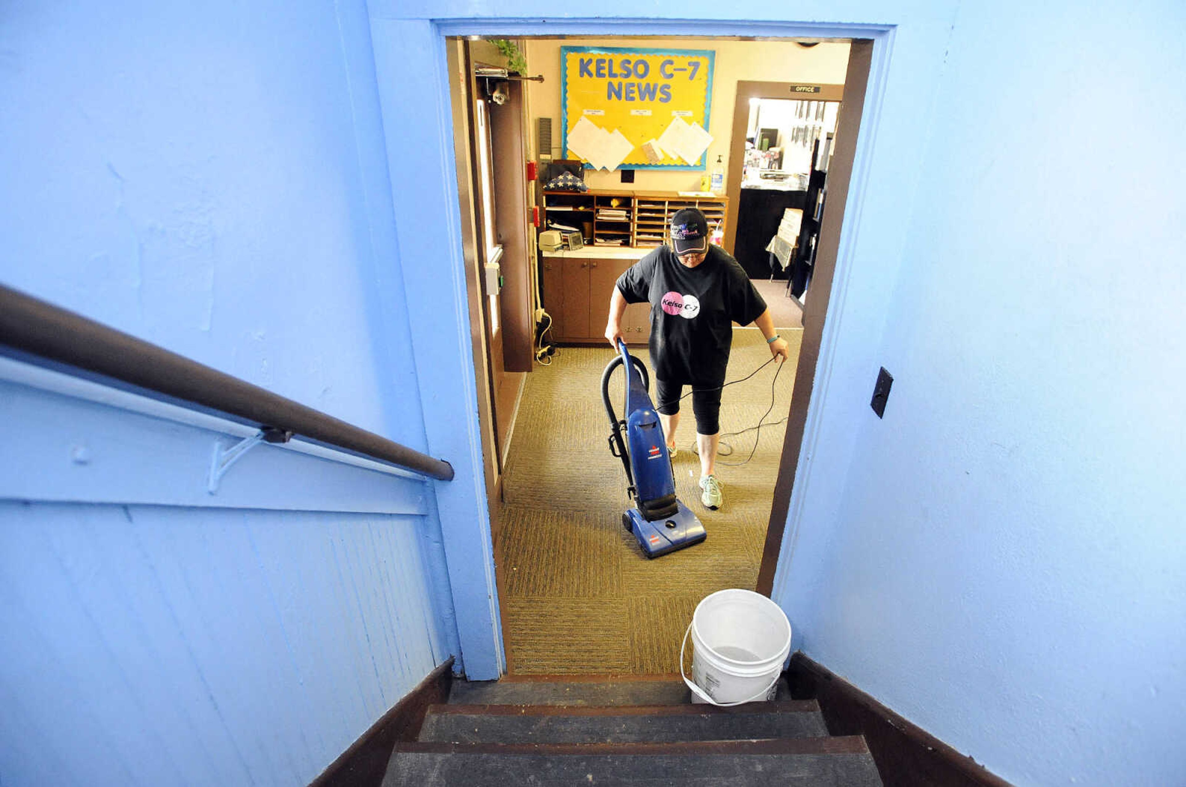 LAURA SIMON ~ lsimon@semissourian.com

Laura Orr vacuums the entryway of Kelso C-7 School in New Hamburg, Missouri on Thursday, July 14, 2016. Orr, who has worked at the school for 29 years as a bus driver and cook, was helping to tidy up before the weekend.