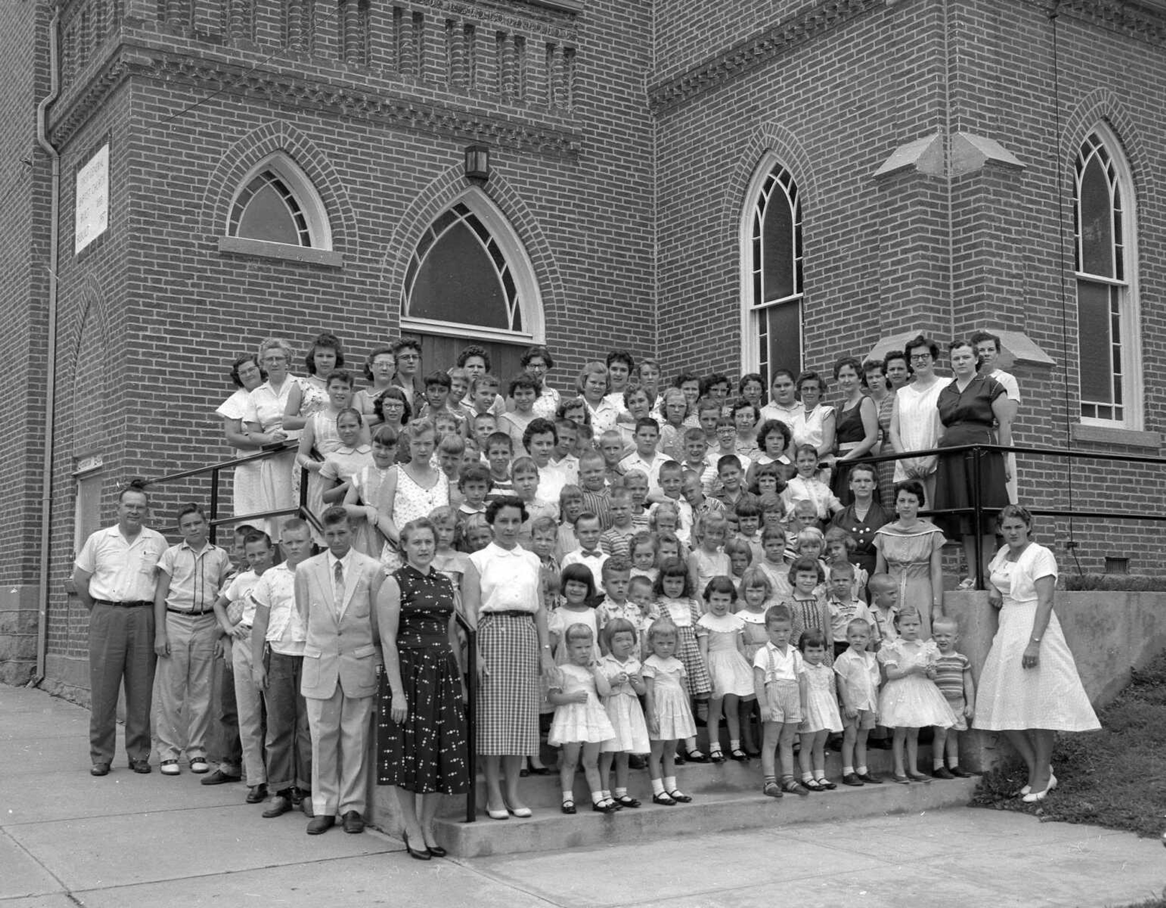 Do you see yourself, or a friend, in this photo taken at First General Baptist Church on Broadway? It may have been taken following a Vacation Bible School.