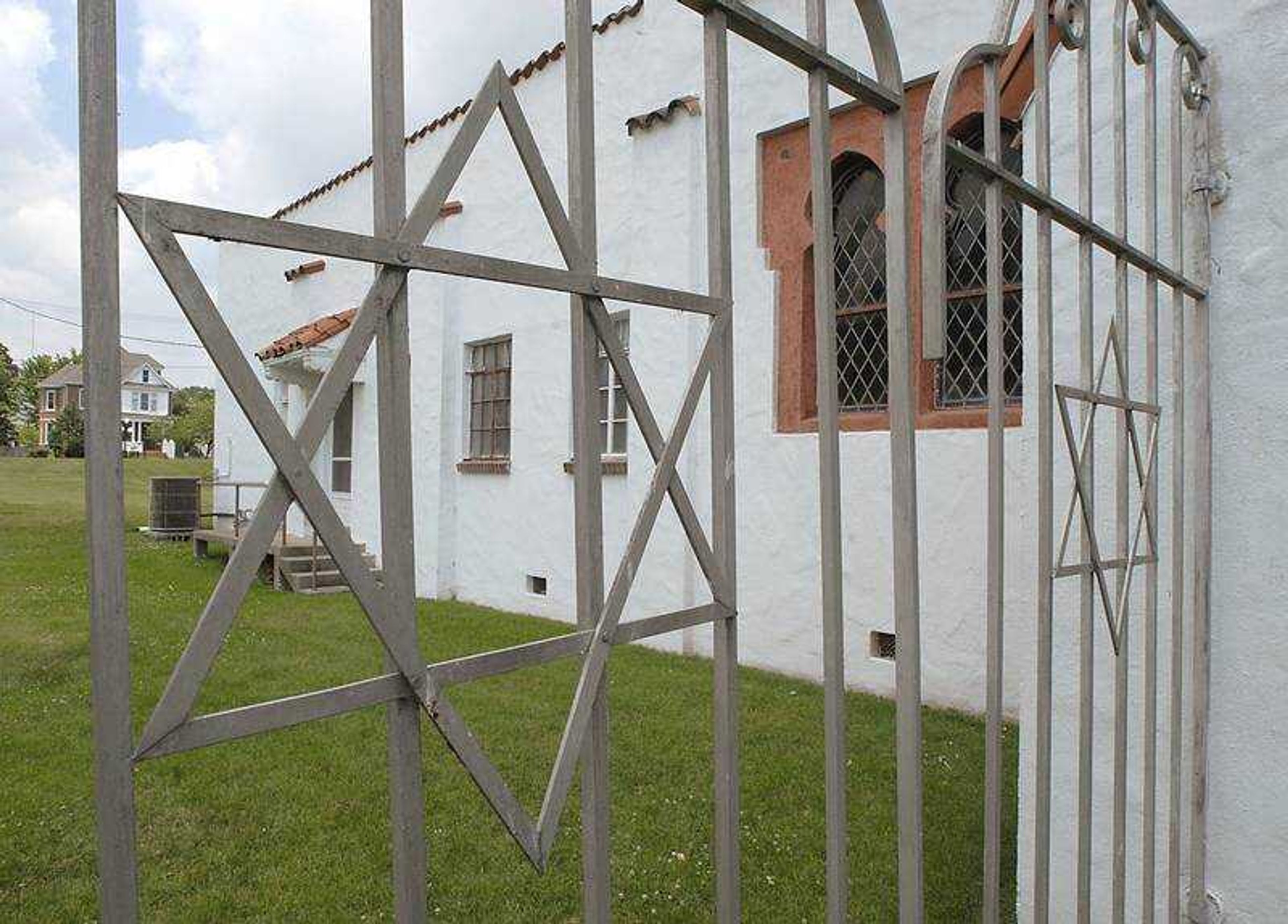 FRED LYNCH ~ flynch@semissourian.com
The Star of David is centered on each of two wrought iron gates on the south side of B'nai Israel Synagogue.