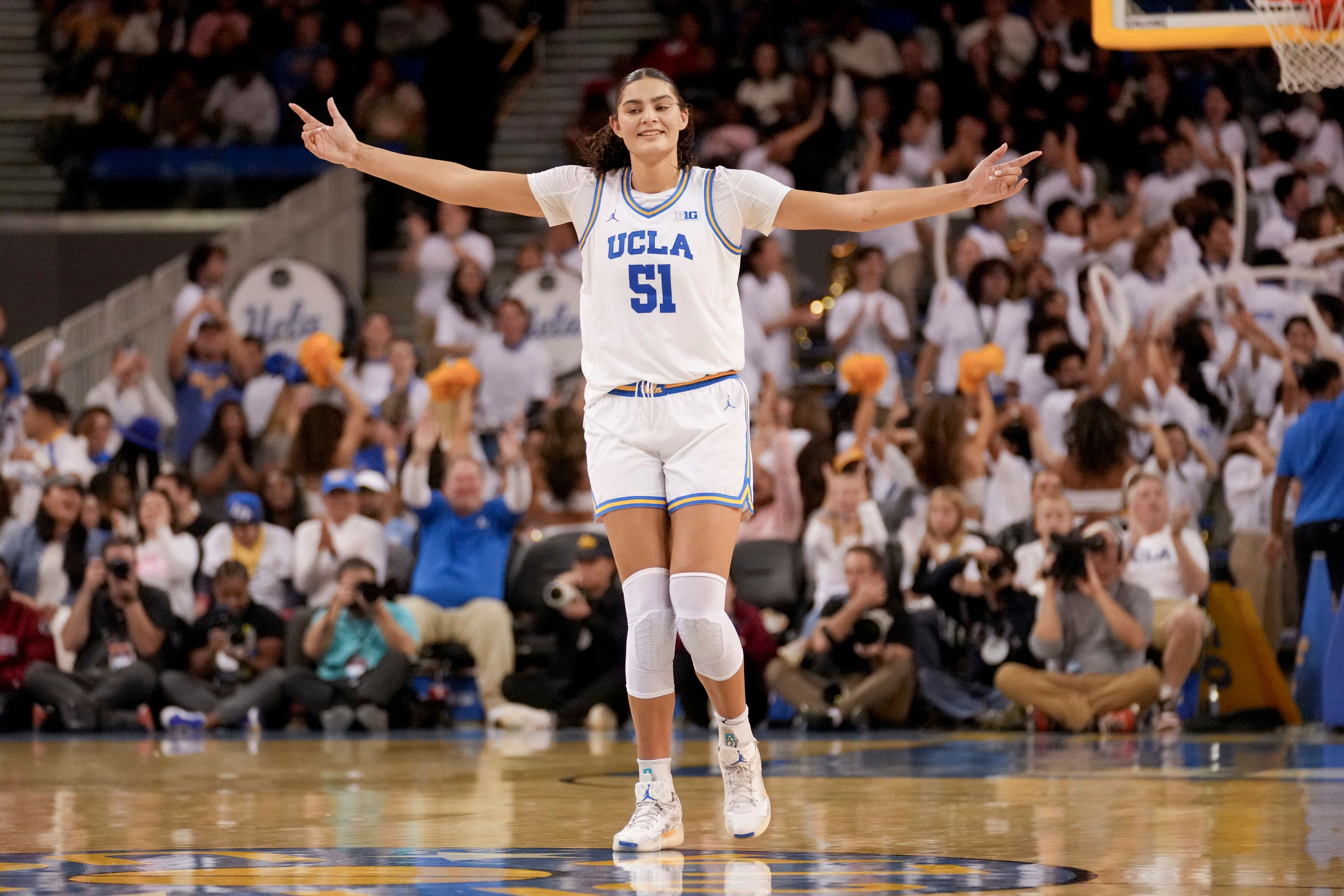 UCLA center Lauren Betts (51) reacts during the first half of an NCAA college basketball game against South Carolina, Sunday, Nov. 24, 2024, in Los Angeles. (AP Photo/Eric Thayer)