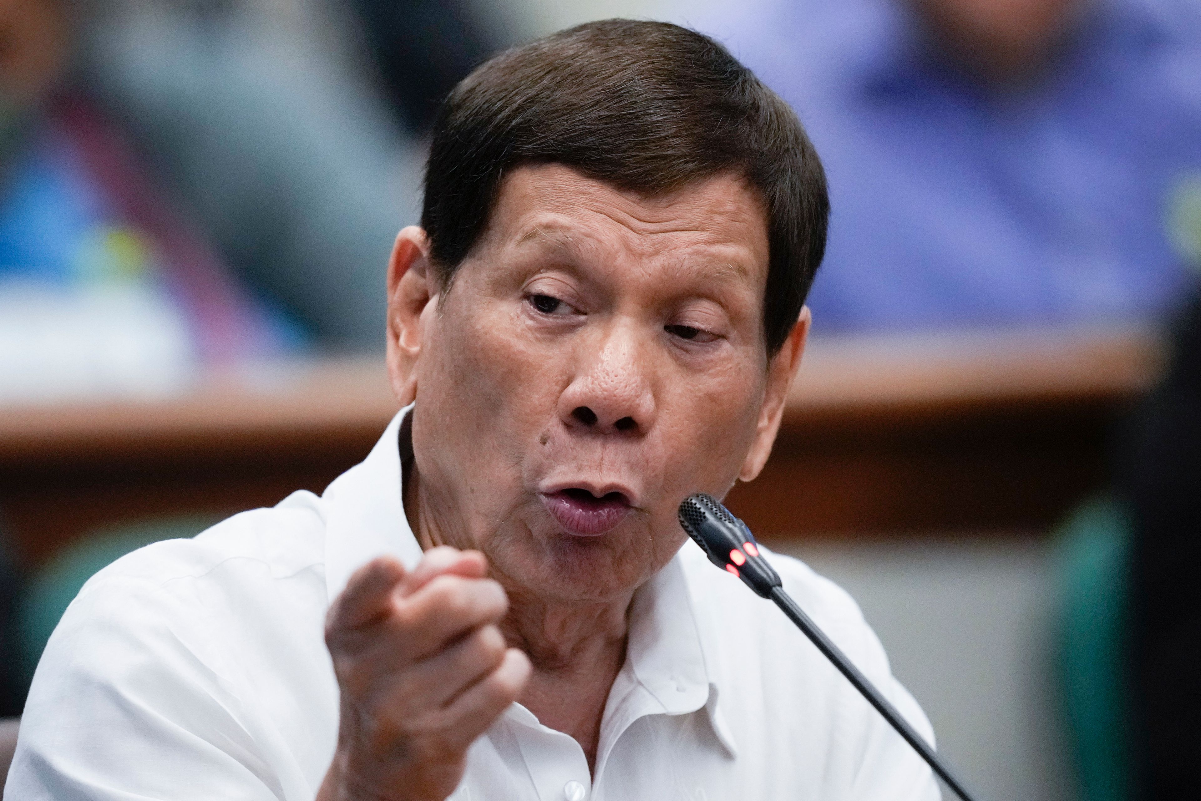 Former Philippine President Rodrigo Duterte speaks during a senate investigation on the war on the drugs during his administration, at the Philippine Senate, Monday, Oct. 28, 2024, in Manila, Philippines. (AP Photo/Aaron Favila)