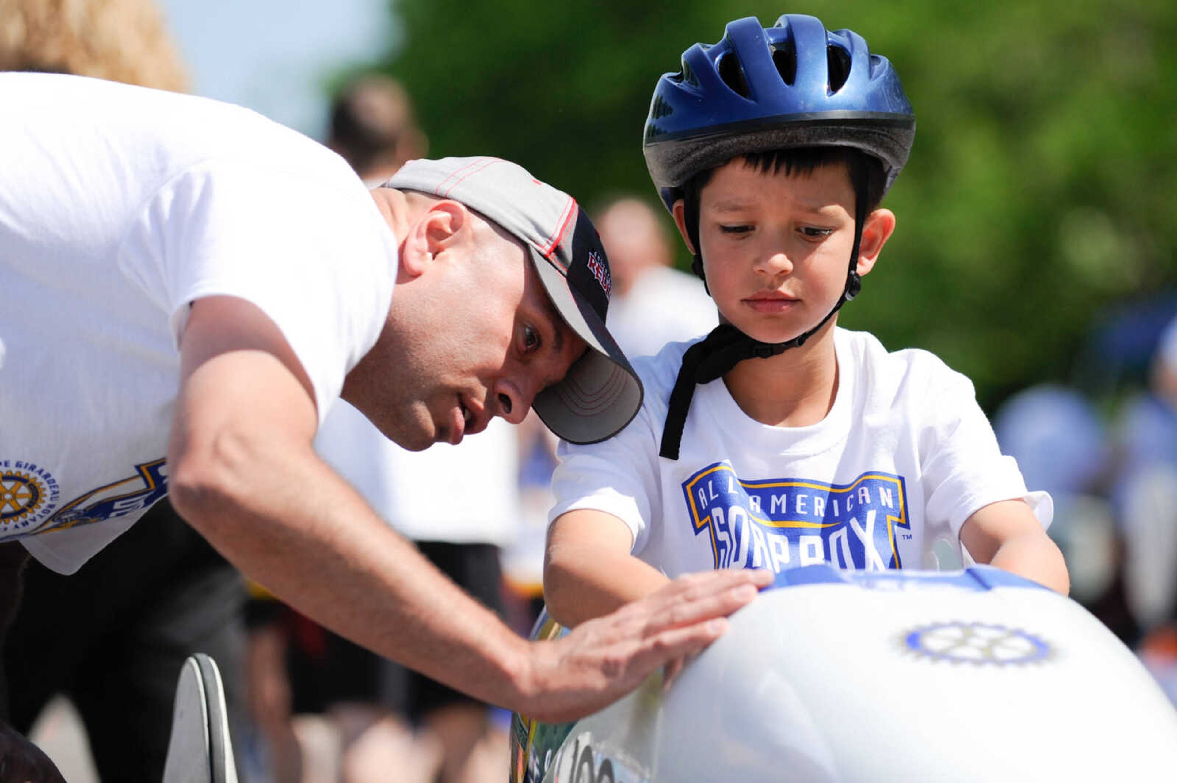 GLENN LANDBERG ~ glandberg@semissourian.com


Gavin Alspaugh gets one last safety check from his father, Brock before his race in the super stock devision of the Cape Girardeau Rotary Club's Soap Box Derby Saturday, May 7, 2016 outside Blanchard Elementary School in Cape Girardeau. The 33 participants raced to qualify for the All American Soap Box Derby national race in Akron, Ohio in July.